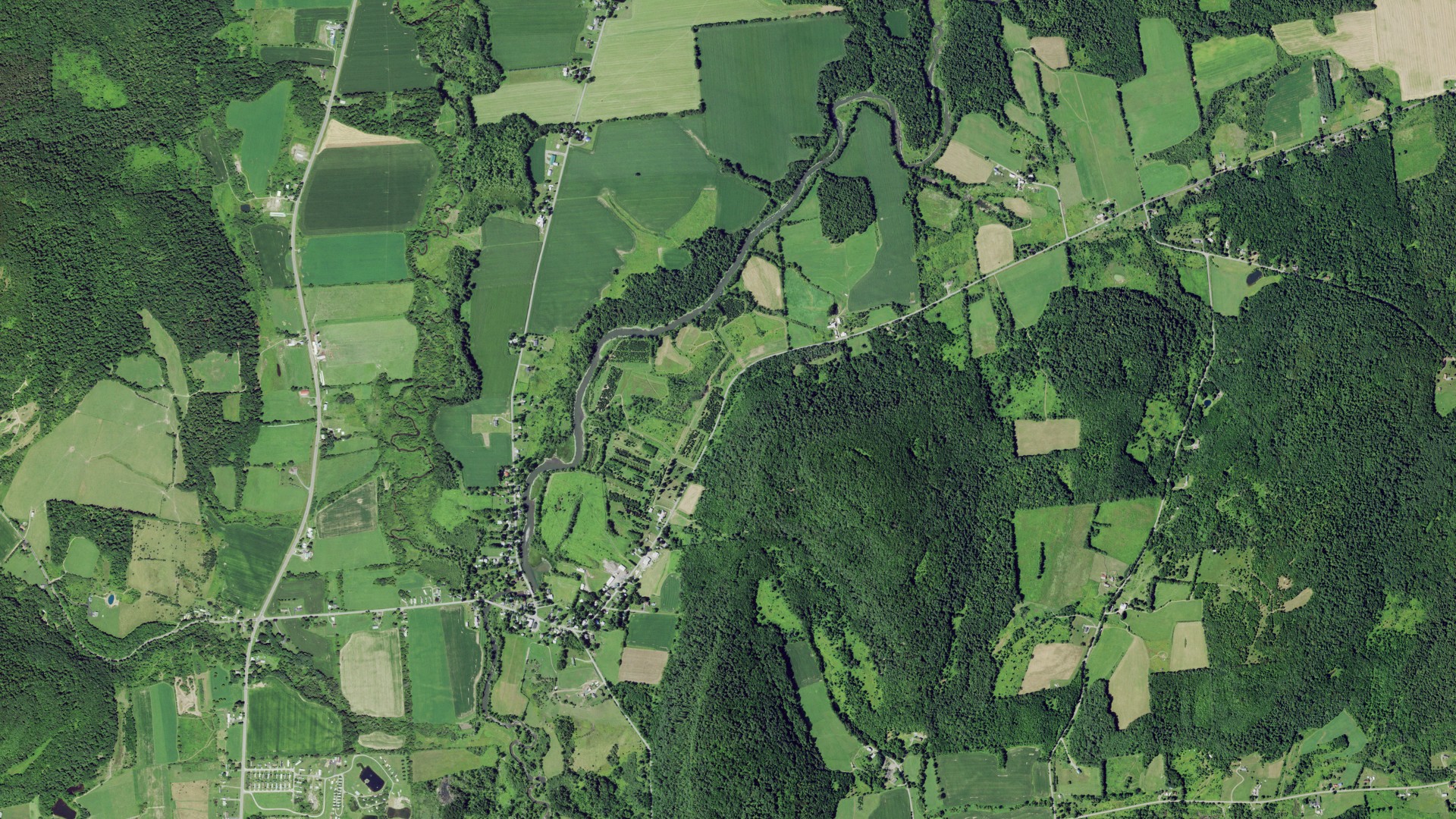 Natural-color aerial photograph of land around Unadilla Forks, New York