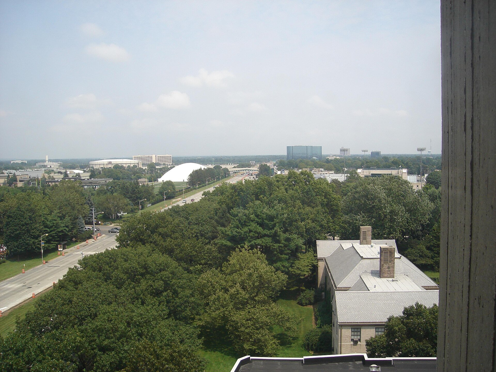 Photograph looking east over Uniondale including Nassau Coliseum, Hempstead Turnpike and Reckson Plaza. — New York