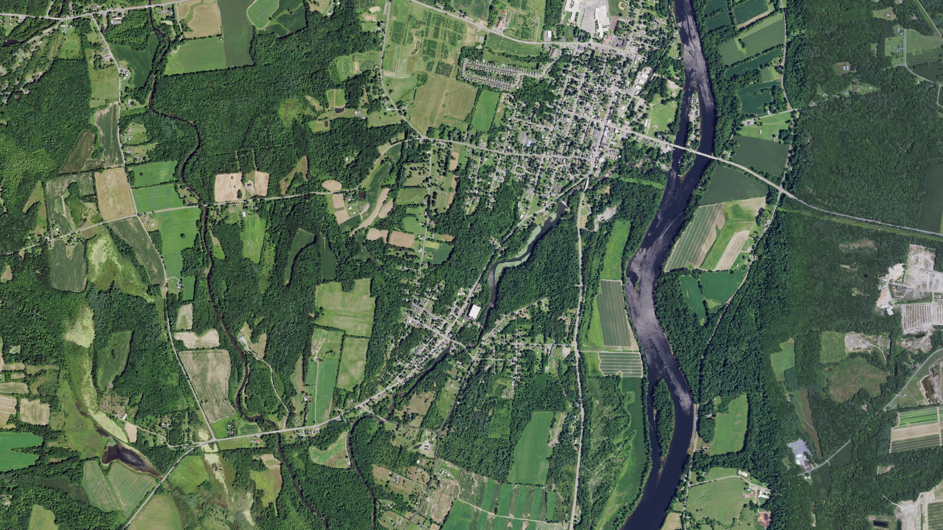 Natural-color aerial photograph of land around Victory, New York
