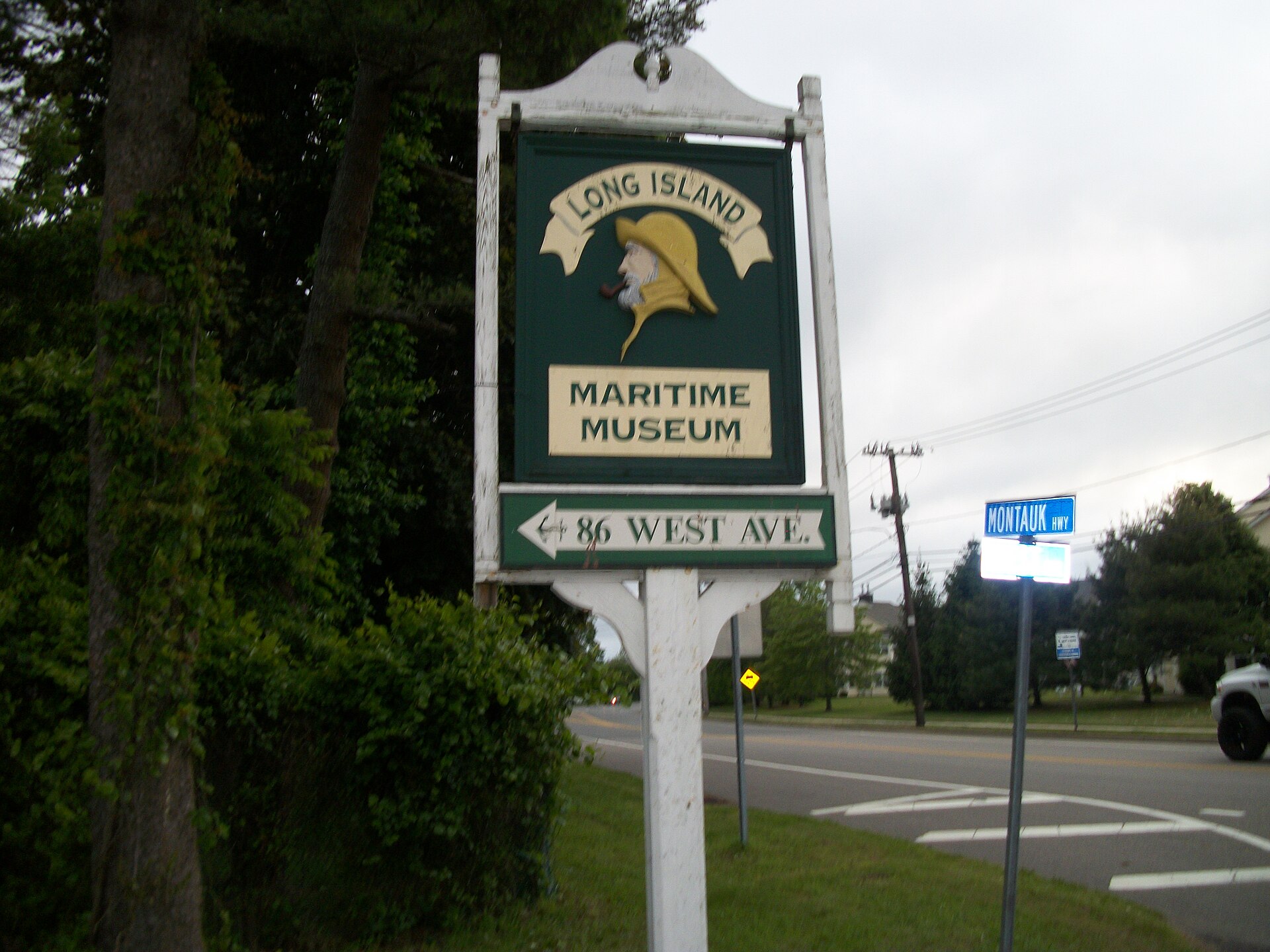 Sign for the entrance to the Long Island Maritime Museum in West Sayville, New York.