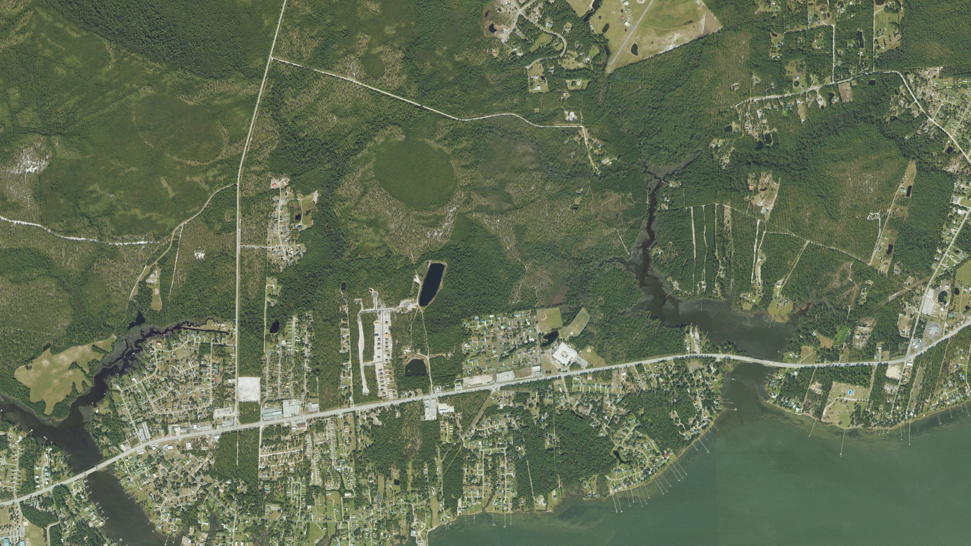 Natural-color aerial photograph of land around Broad Creek, North Carolina