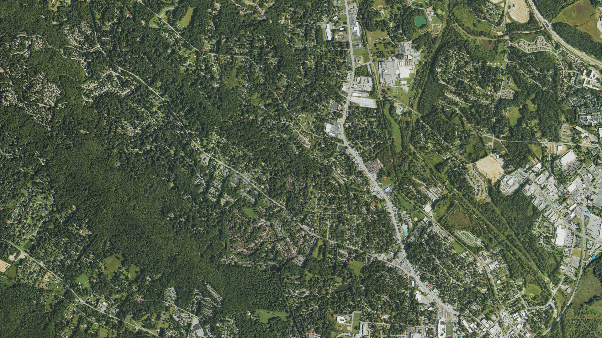 Natural-color aerial photograph of land around Henderson County, North Carolina