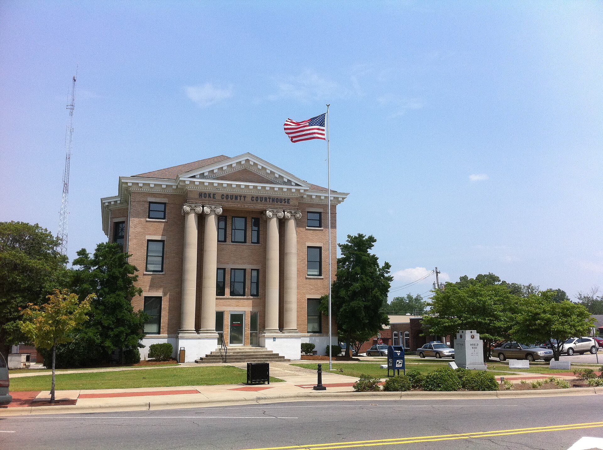 Hoke County Courthouse and the War Memorial monument in Raeford, North Carolina.