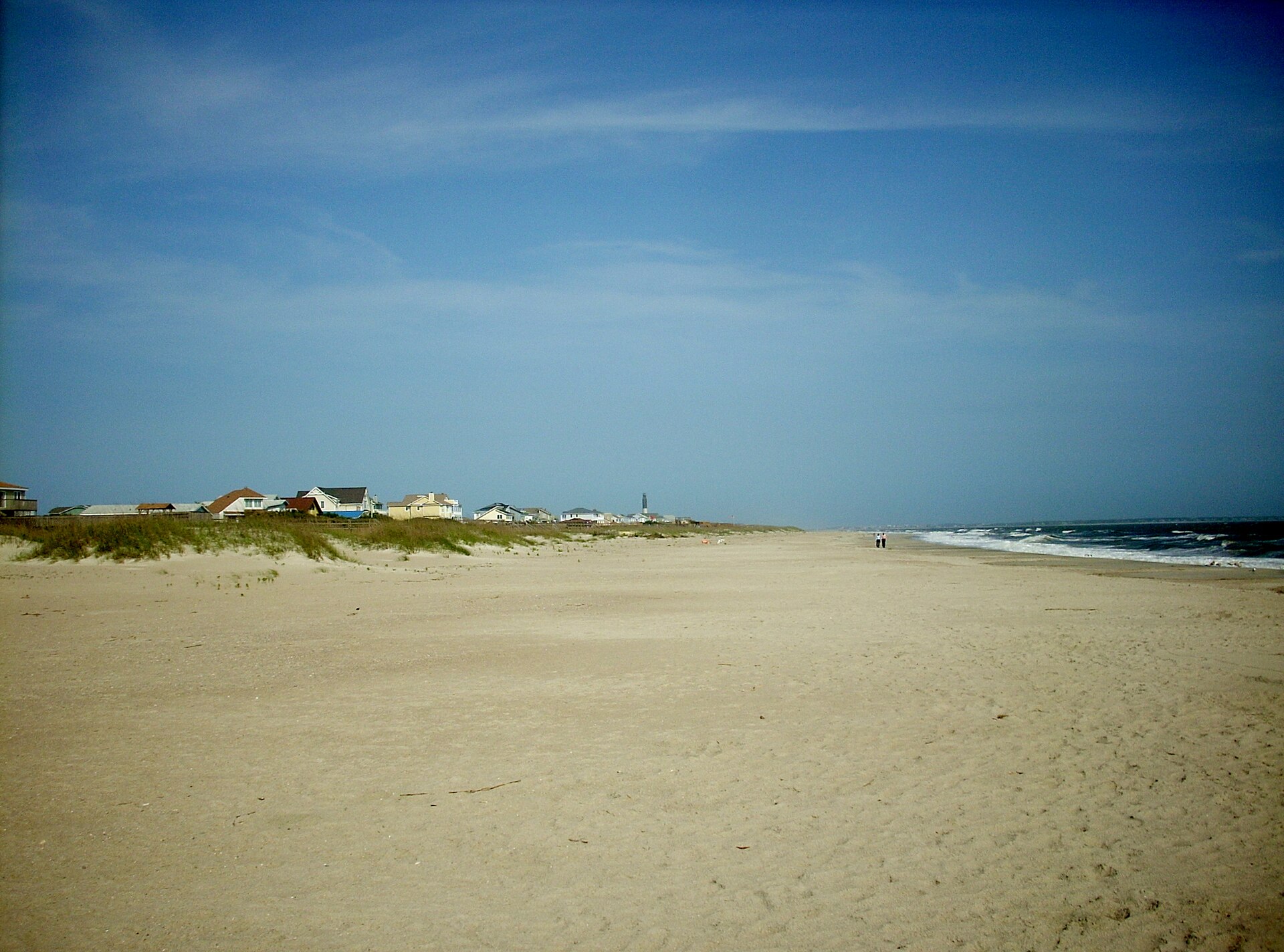 and the Oak Island Lighthouse in the distance — Caswell Beach, North Carolina