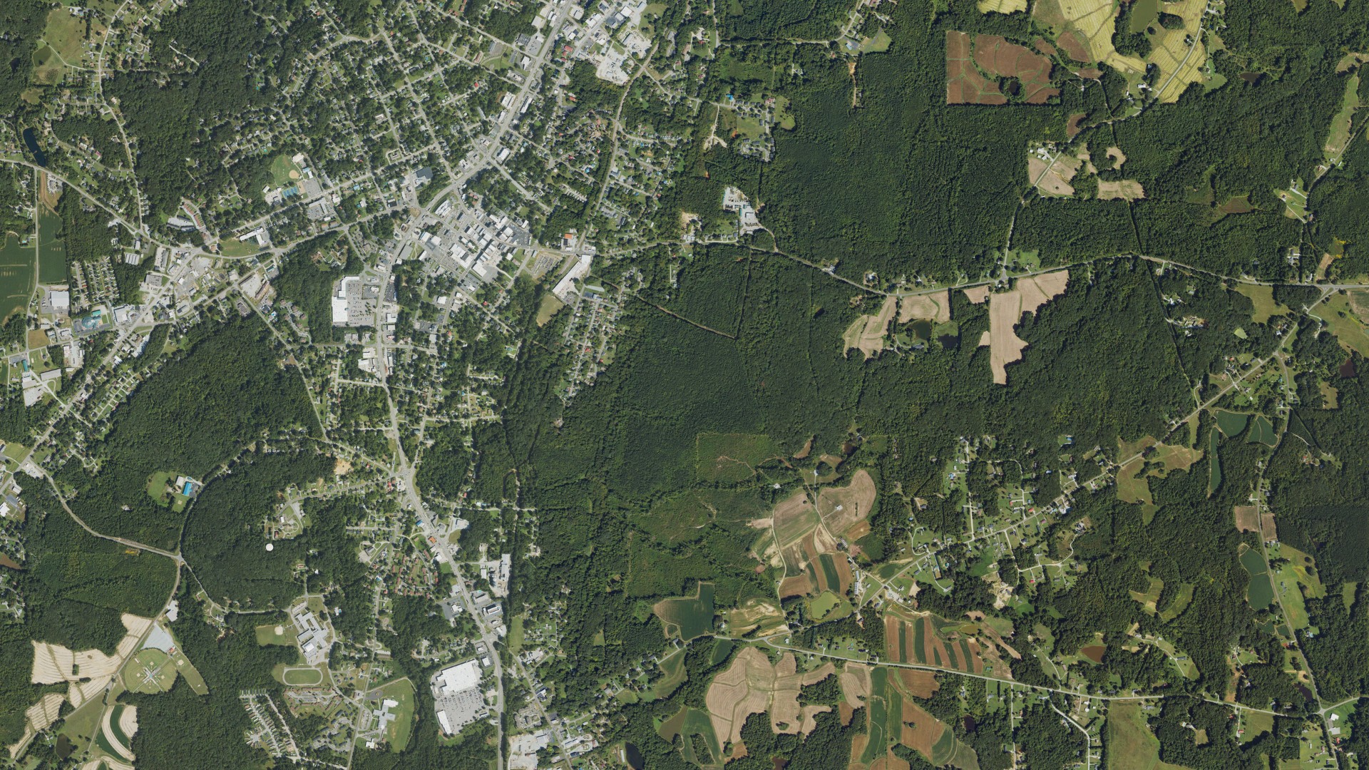 Natural-color aerial photograph of land around Person County, North Carolina