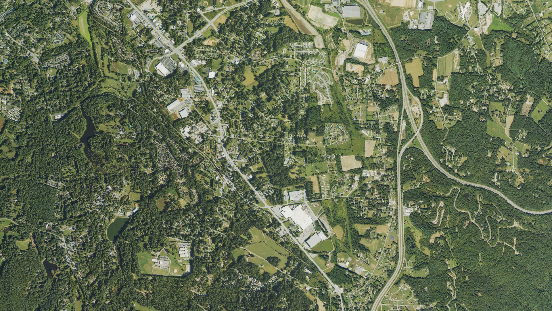 Natural-color aerial photograph of land around East Flat Rock, North Carolina