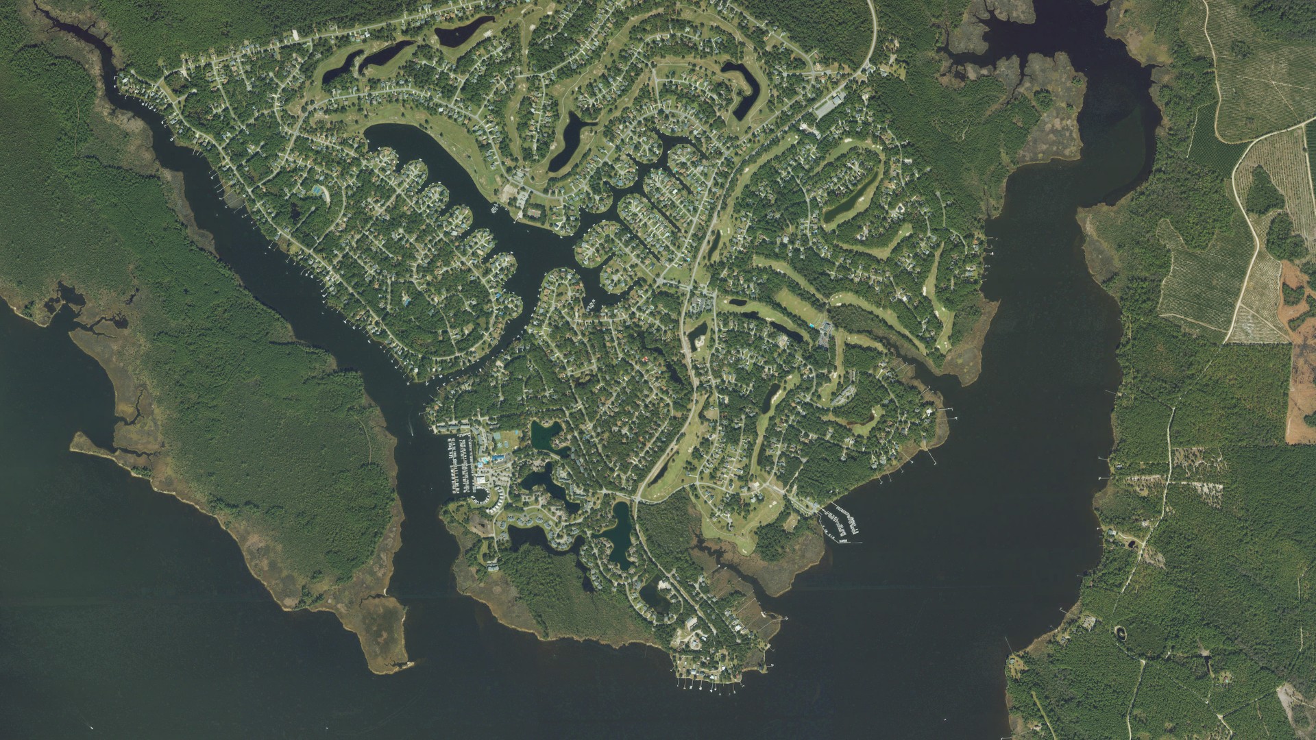 Natural-color aerial photograph of land around Fairfield Harbour, North Carolina
