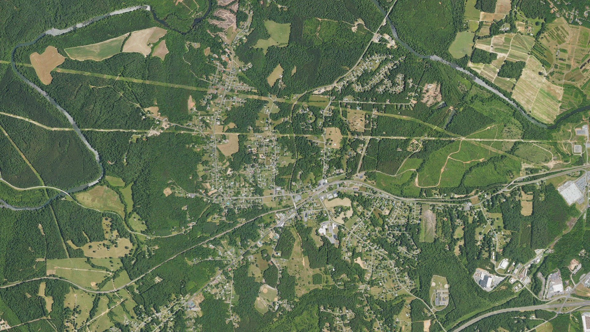 Natural-color aerial photograph of land around Glen Alpine, North Carolina