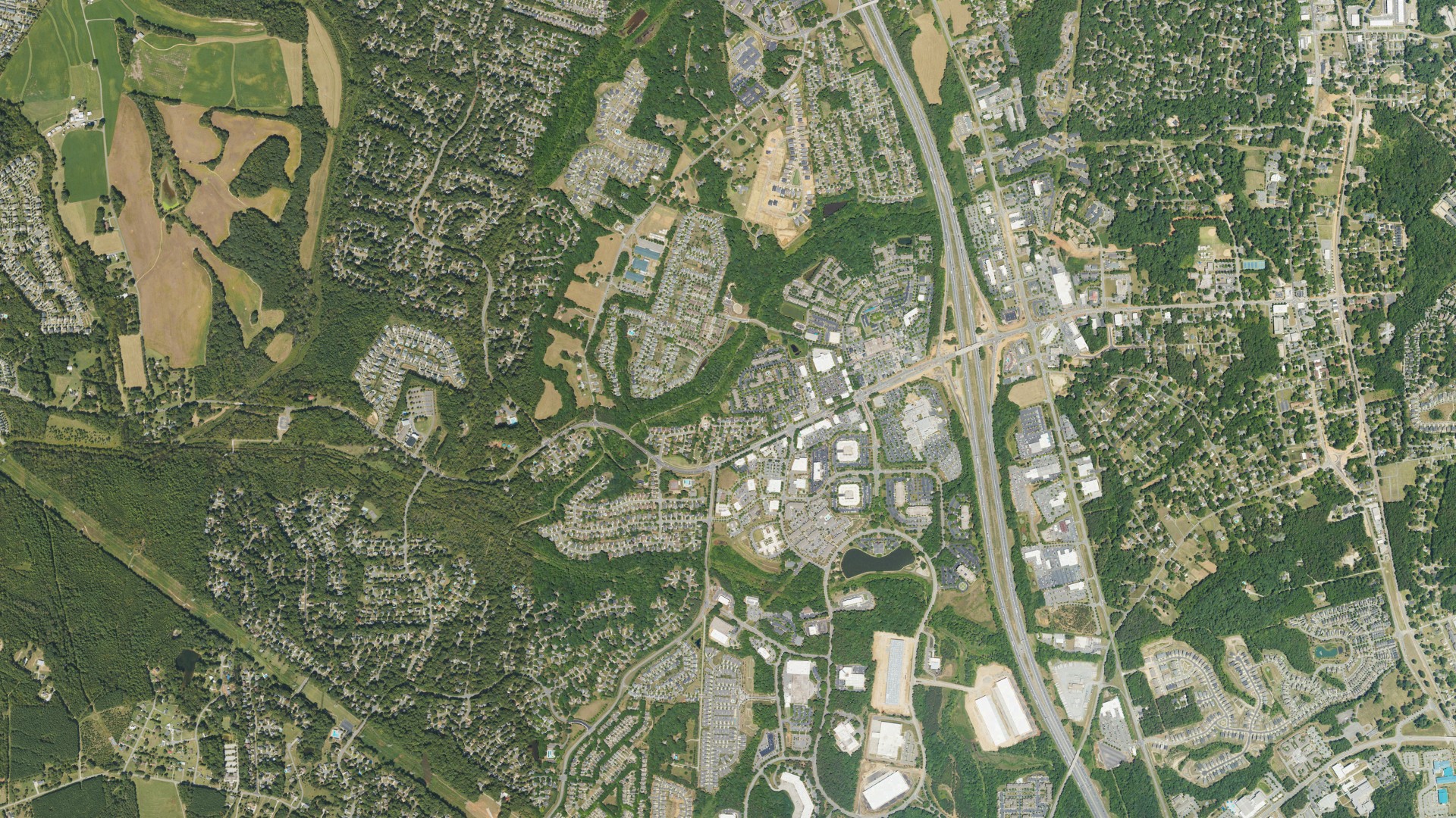 Natural-color aerial photograph of land around Huntersville, North Carolina