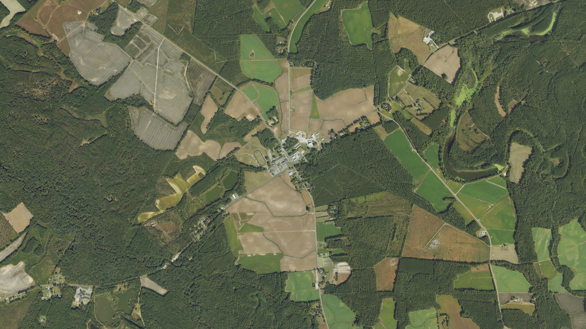 Natural-color aerial photograph of land around Leggett, North Carolina