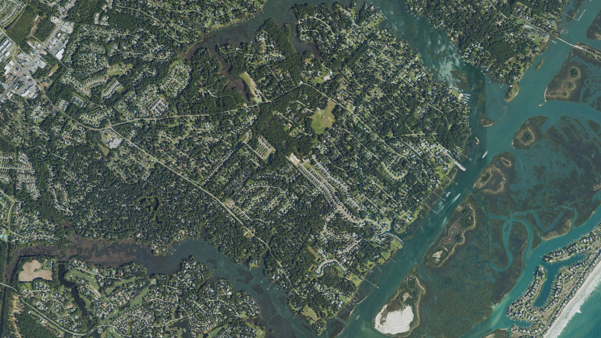 Natural-color aerial photograph of land around Ogden, North Carolina