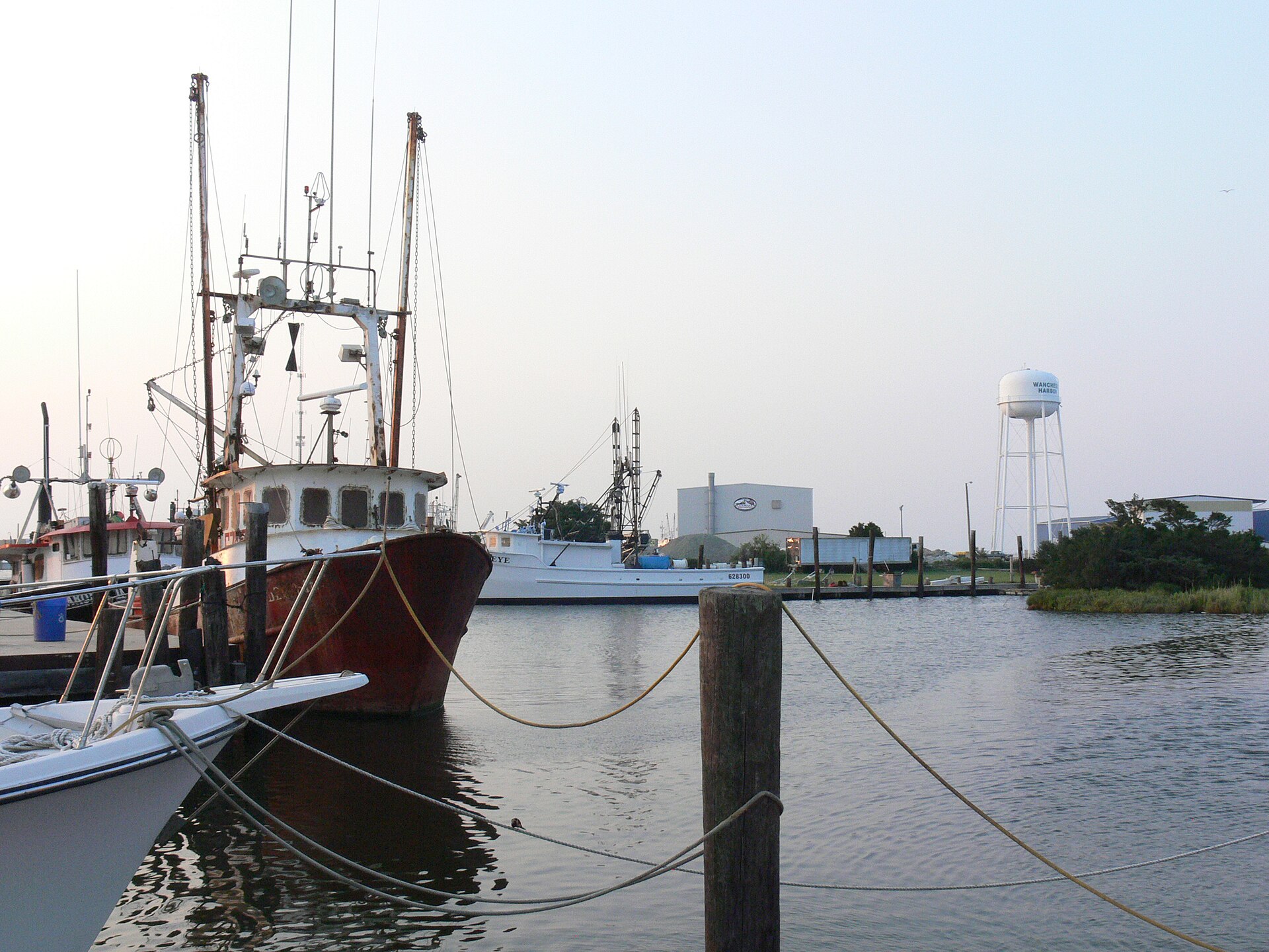 Boats at the entrance to Wanchese Harbor, Dare County, North Carolina