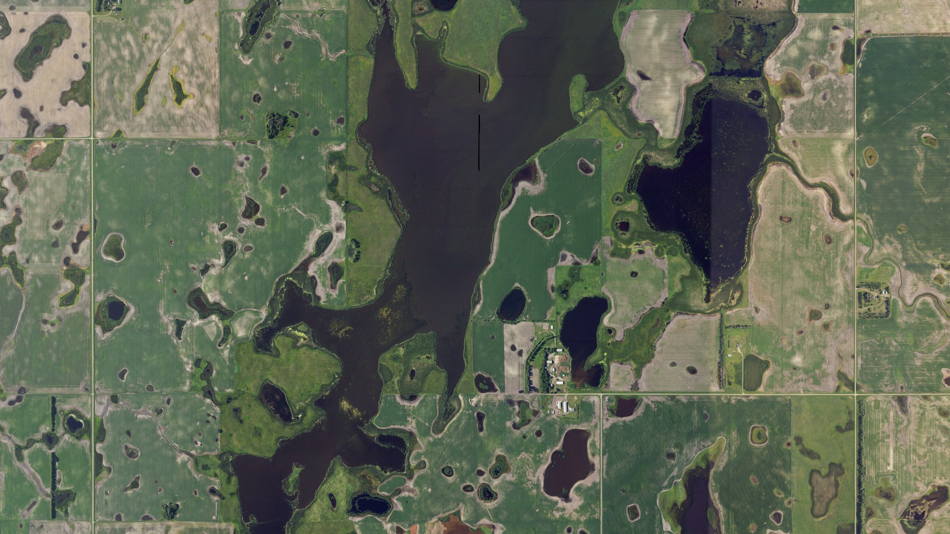 Natural-color aerial photograph of land around Brimer, North Dakota