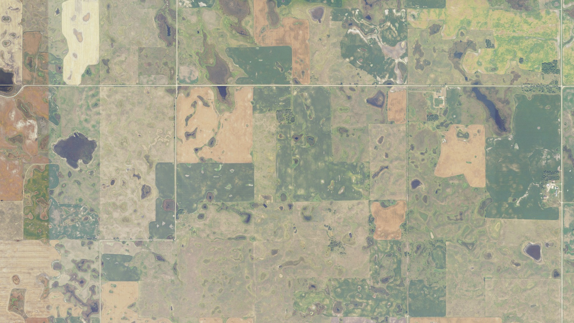 Natural-color aerial photograph of land around Aurora, North Dakota