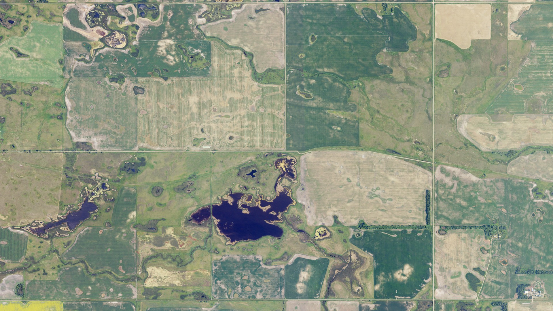 Natural-color aerial photograph of land around McClellan, North Dakota