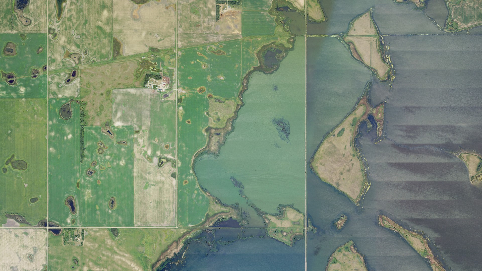 Natural-color aerial photograph of land around Riggin, North Dakota