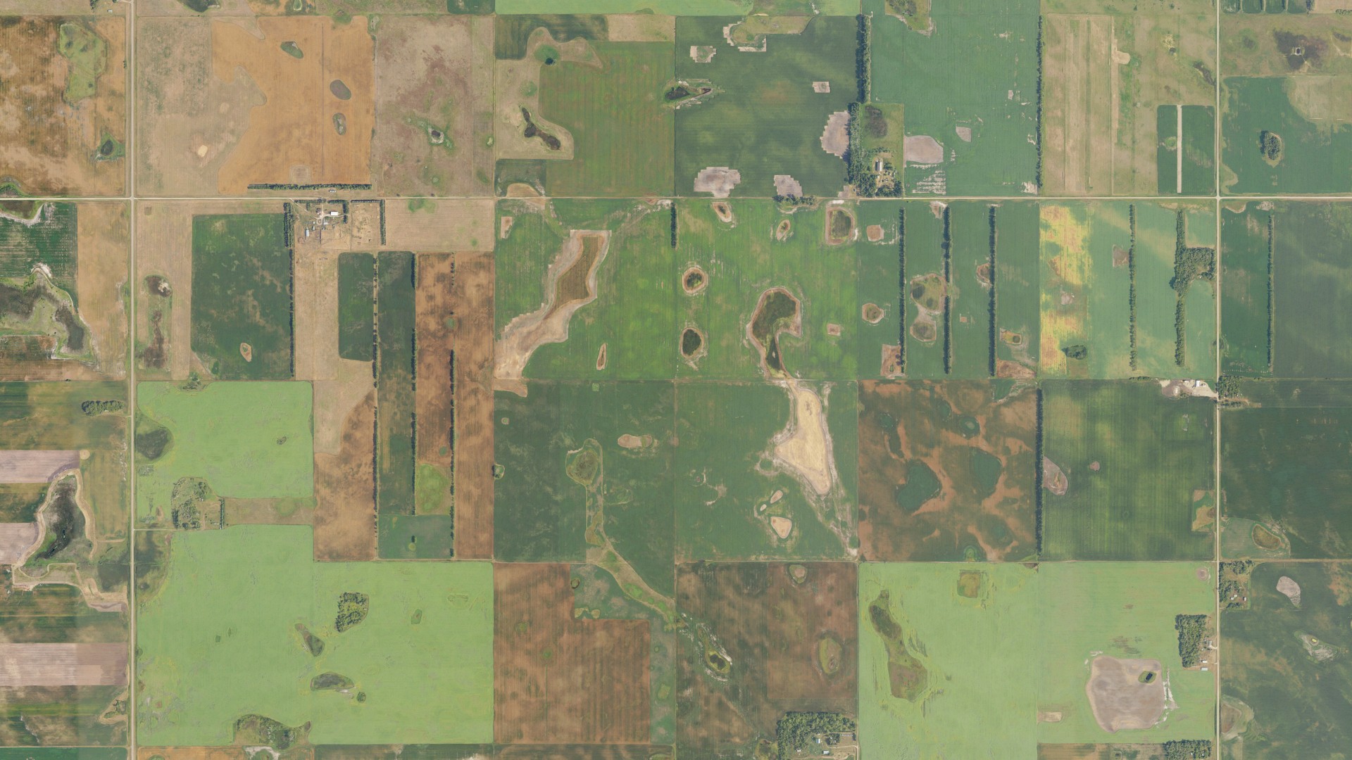 Aerial view of land around Ostby, North Dakota