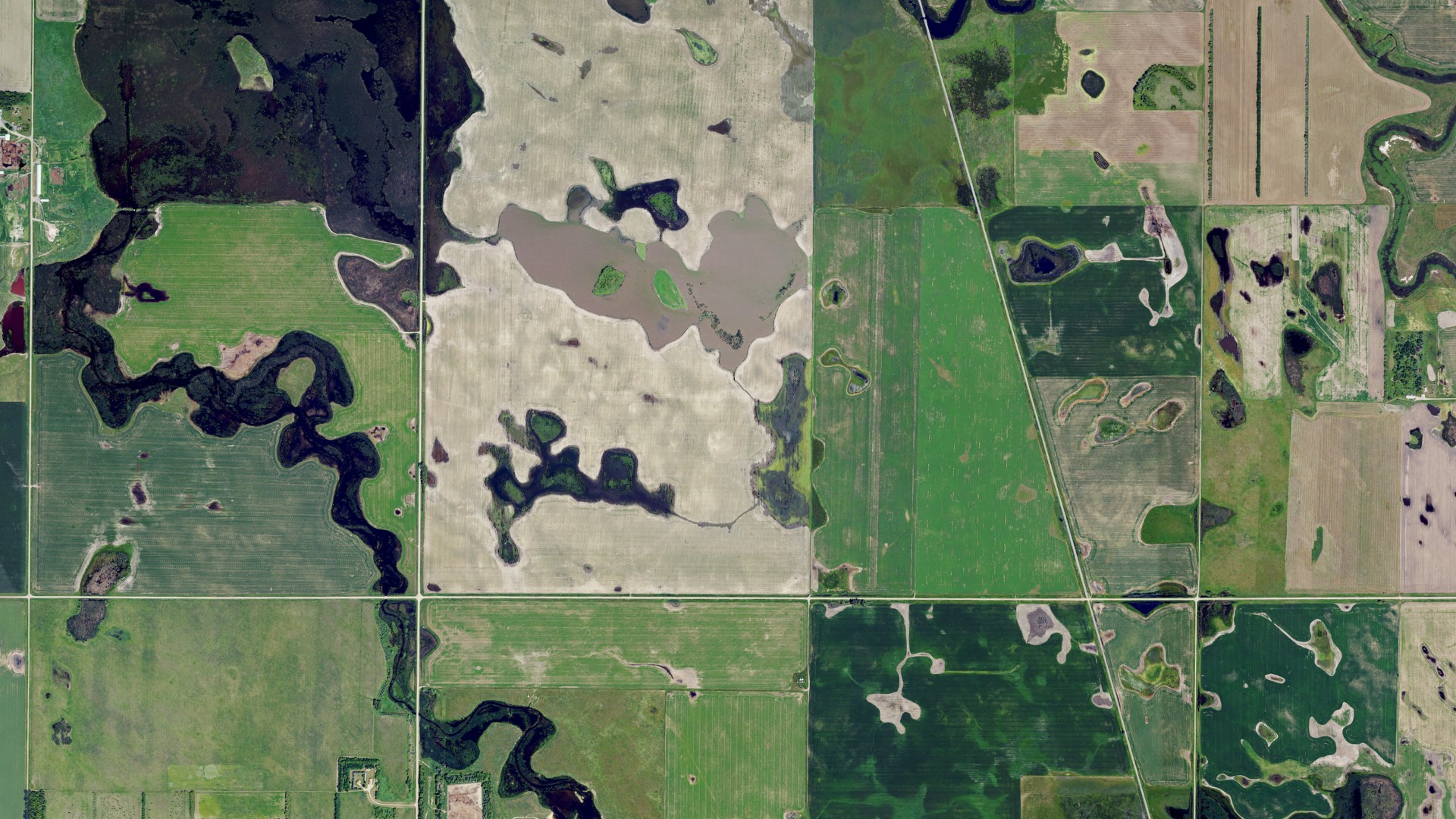 Natural-color aerial photograph of land around Logan, North Dakota