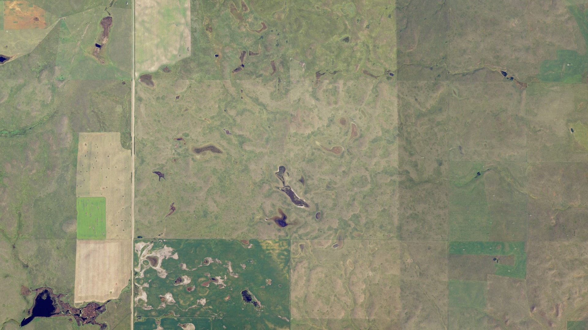 Aerial view of land around Wing, North Dakota