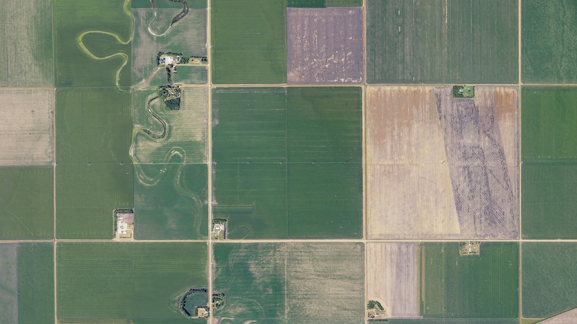Natural-color aerial photograph of land around Warren, North Dakota