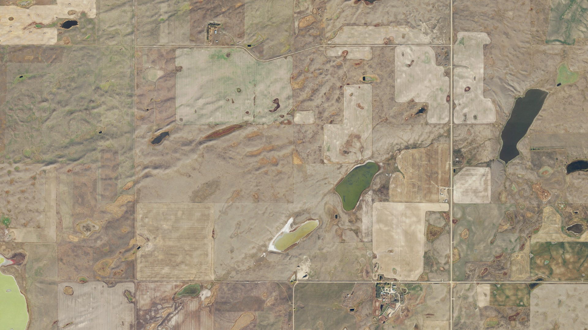 Natural-color aerial photograph of land around Writing Rock, North Dakota