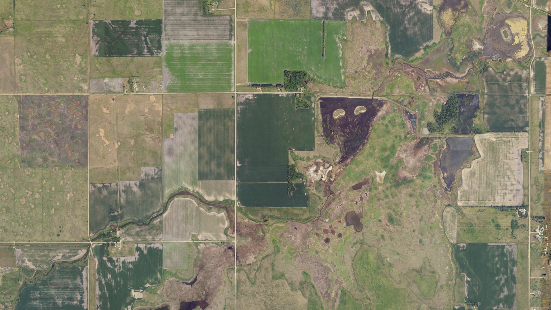 Natural-color aerial photograph of land around Blooming, North Dakota