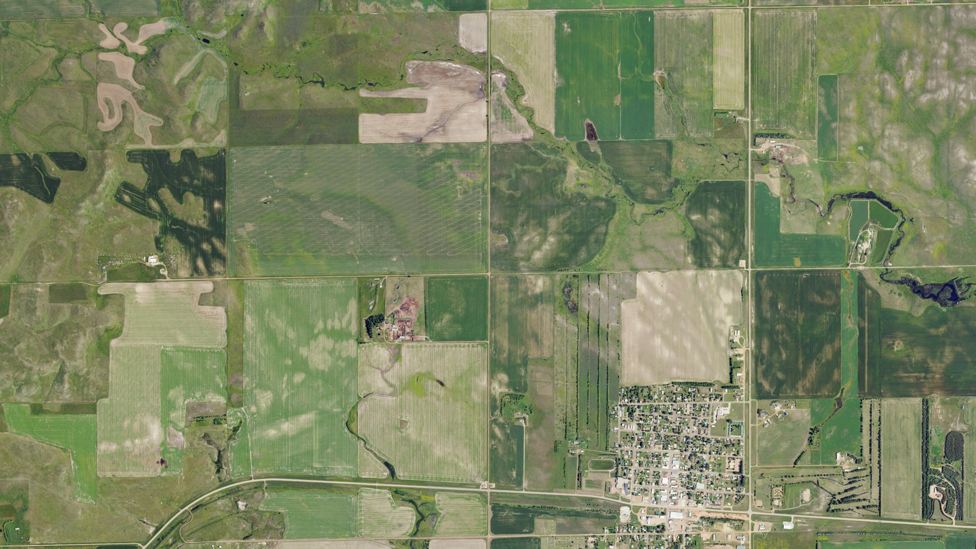Natural-color aerial photograph of land around Minnie, North Dakota