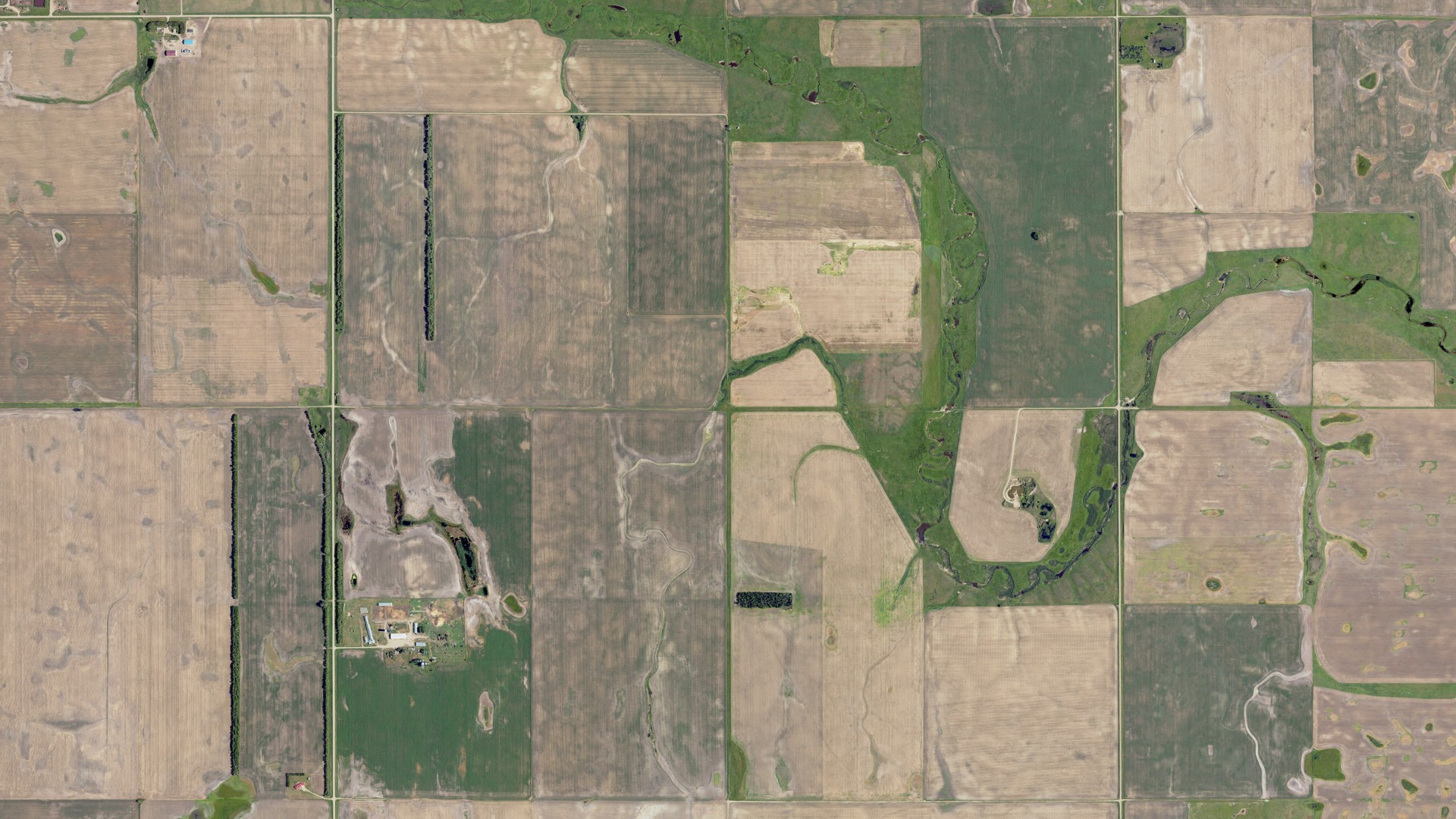 Natural-color aerial photograph of land around Wano, North Dakota