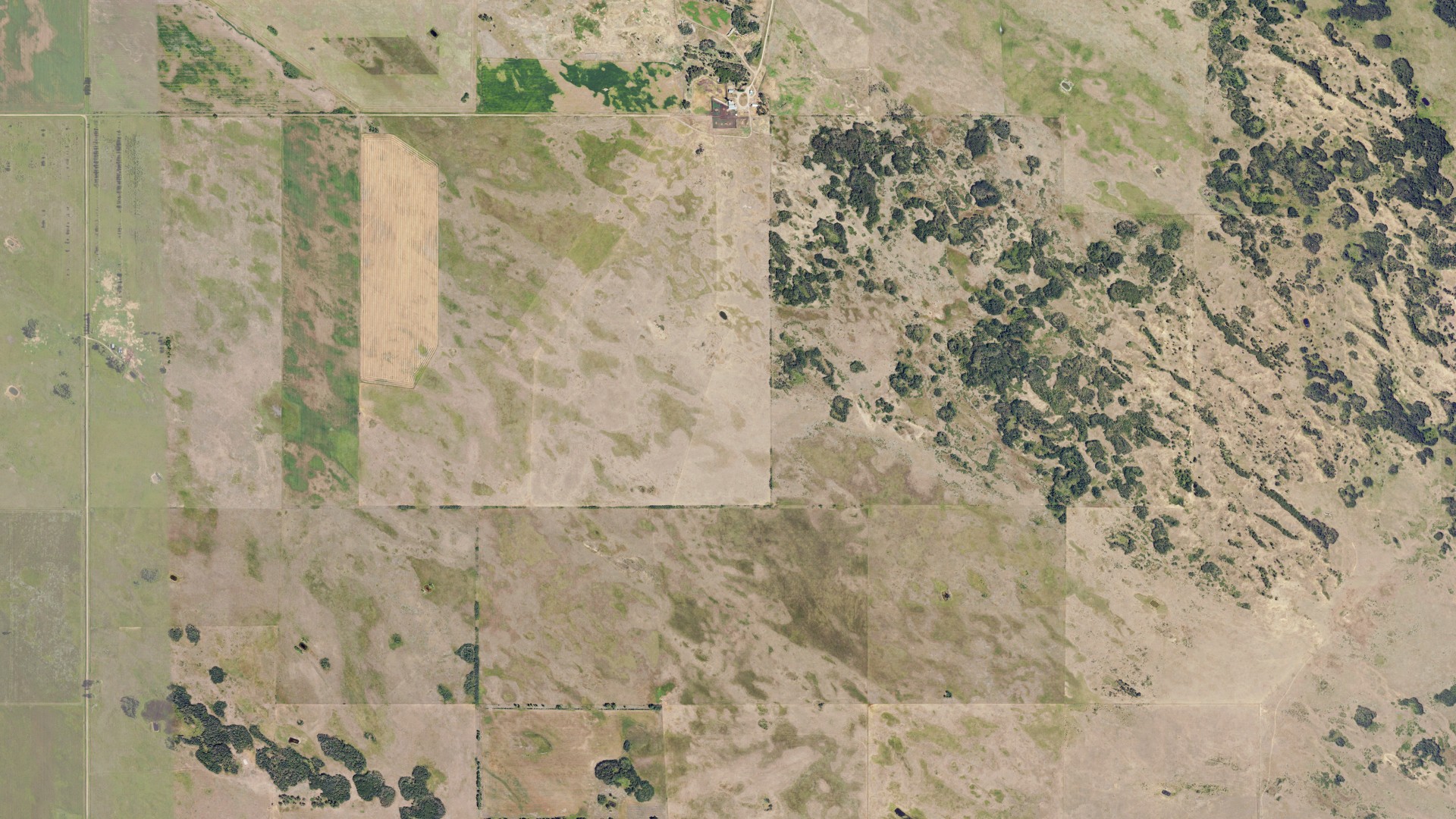 Natural-color aerial photograph of land around Rose Hill, North Dakota