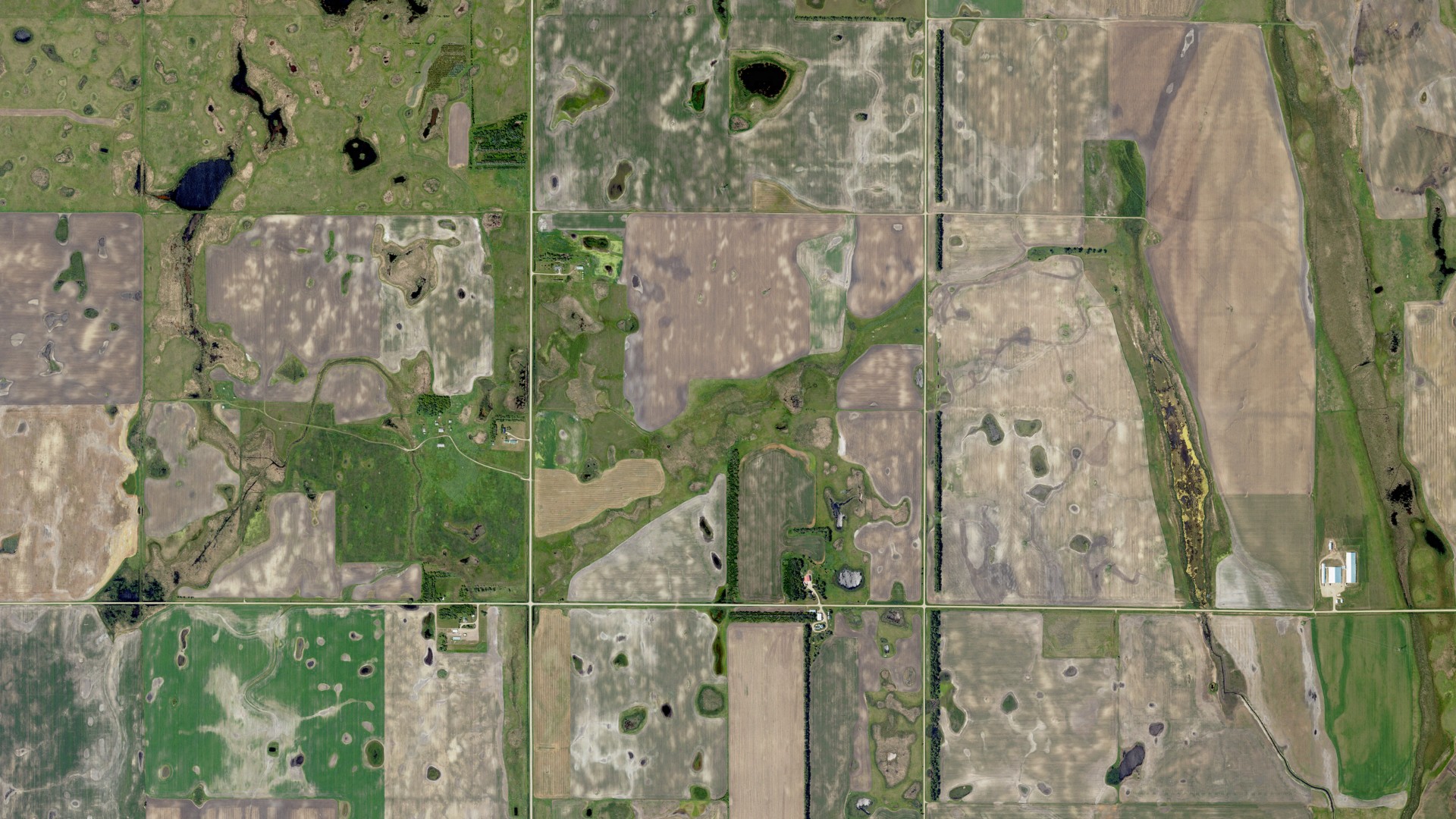 Natural-color aerial photograph of land around Isley, North Dakota