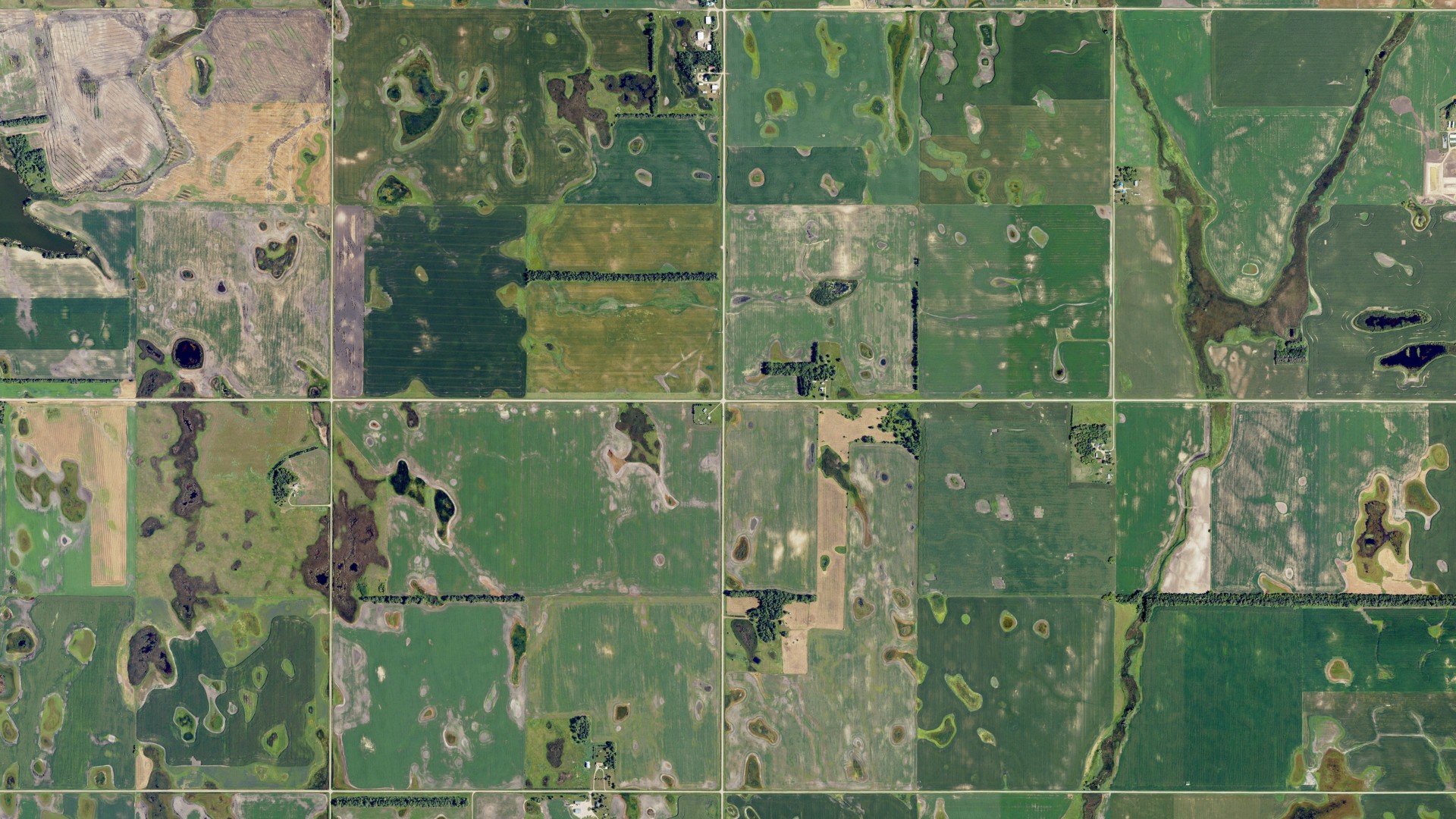 Natural-color aerial photograph of land around Moore, North Dakota