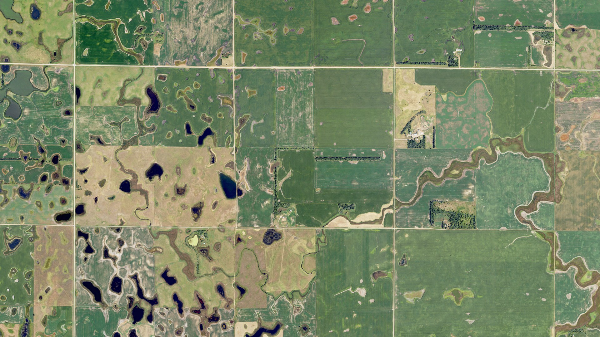 Natural-color aerial photograph of land around Shuman, North Dakota