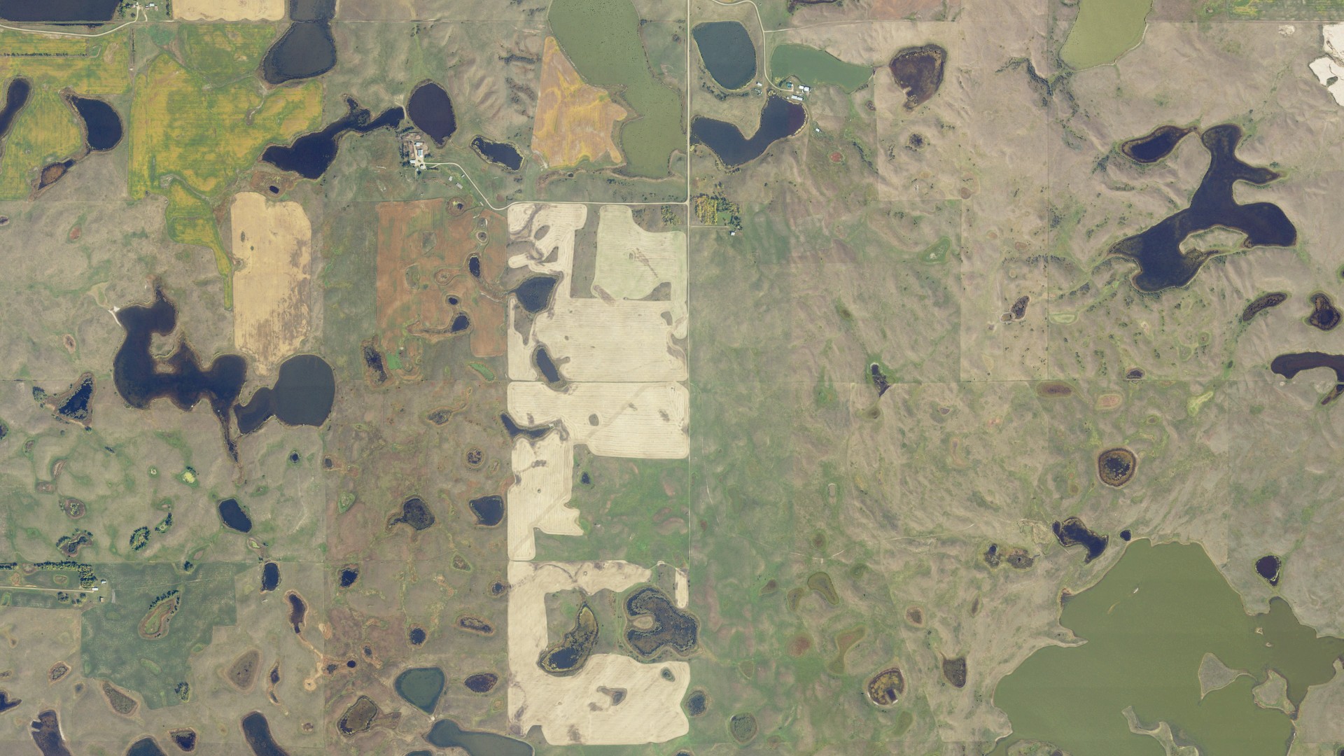 Natural-color aerial photograph of land around Mauch, North Dakota