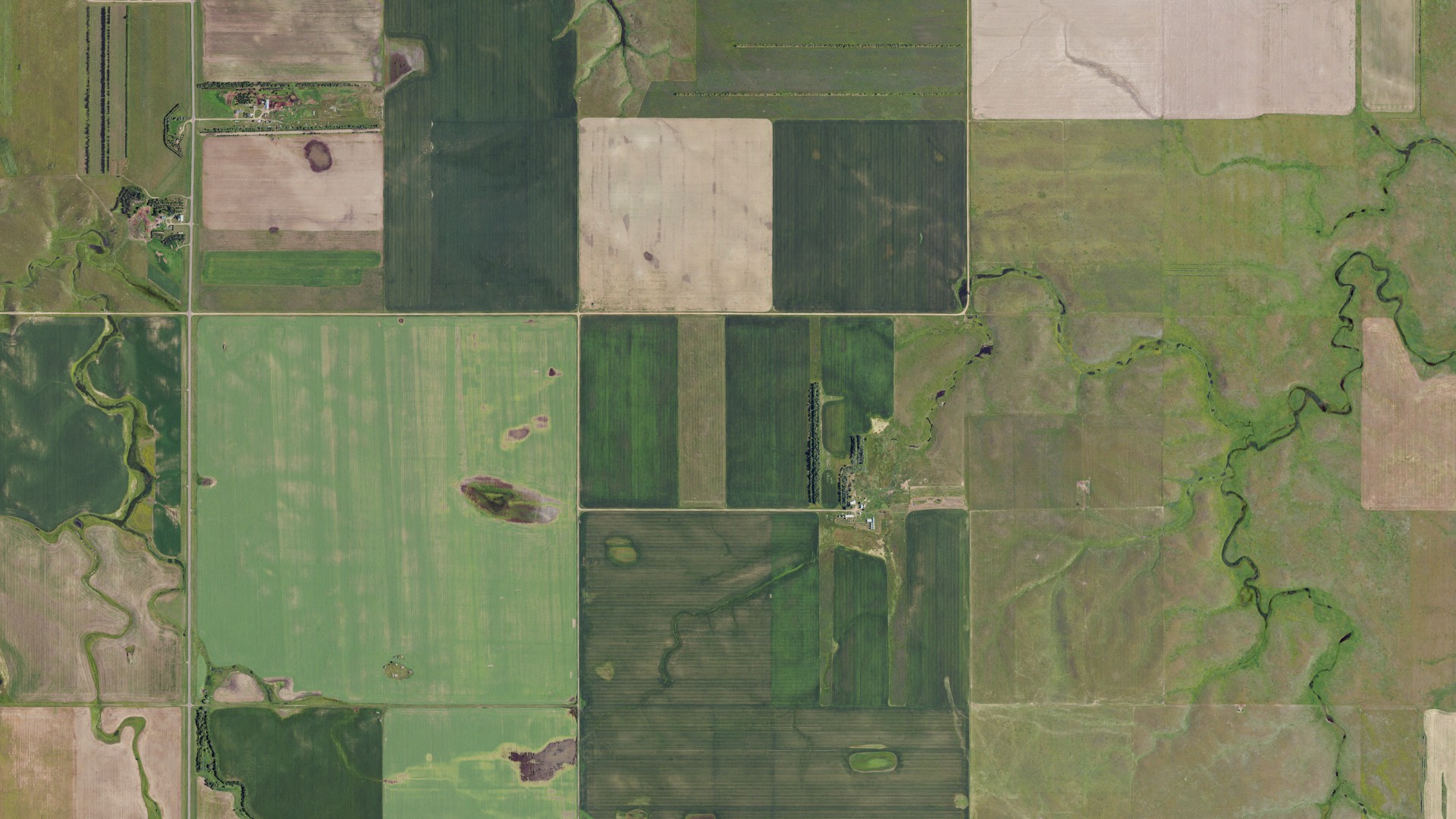 Natural-color aerial photograph of land around Menz, North Dakota