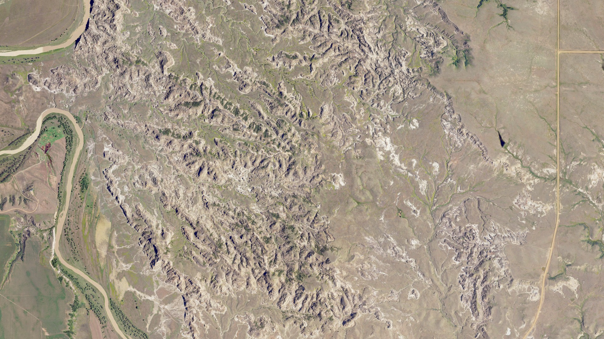Natural-color aerial photograph of land around Hughes, North Dakota