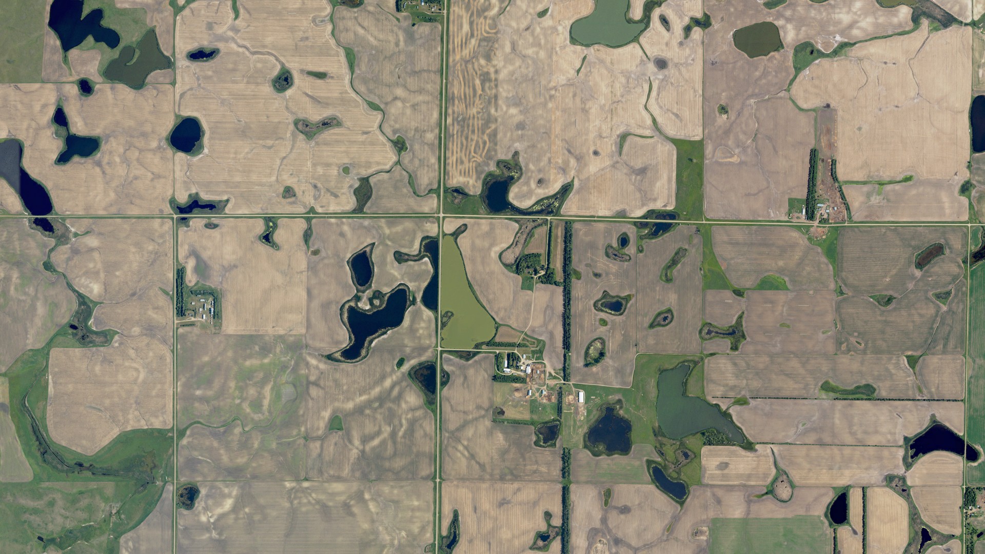 Natural-color aerial photograph of land around Sinclair, North Dakota