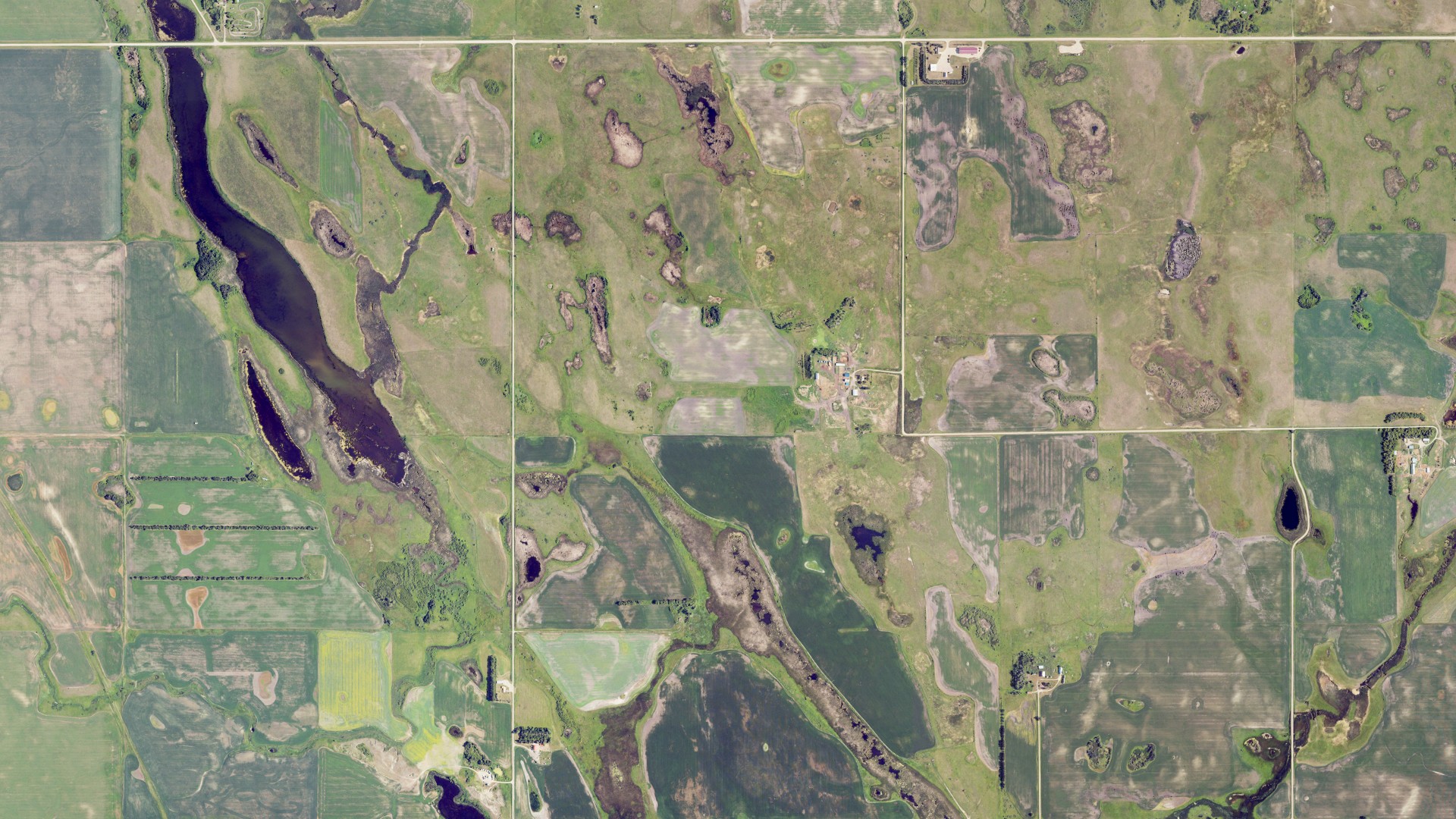Natural-color aerial photograph of land around Sidney, North Dakota