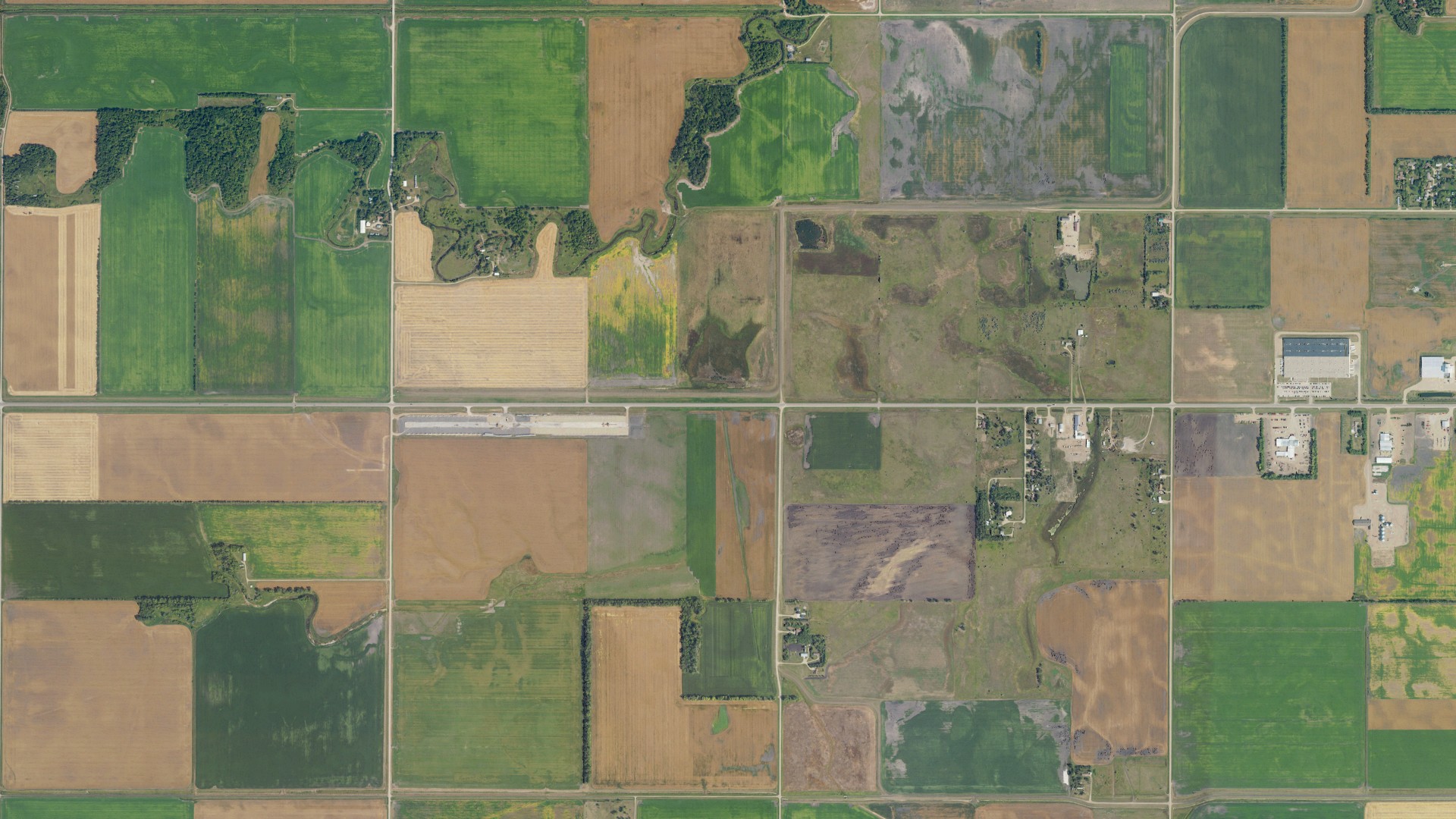 Natural-color aerial photograph of land around Grafton, North Dakota