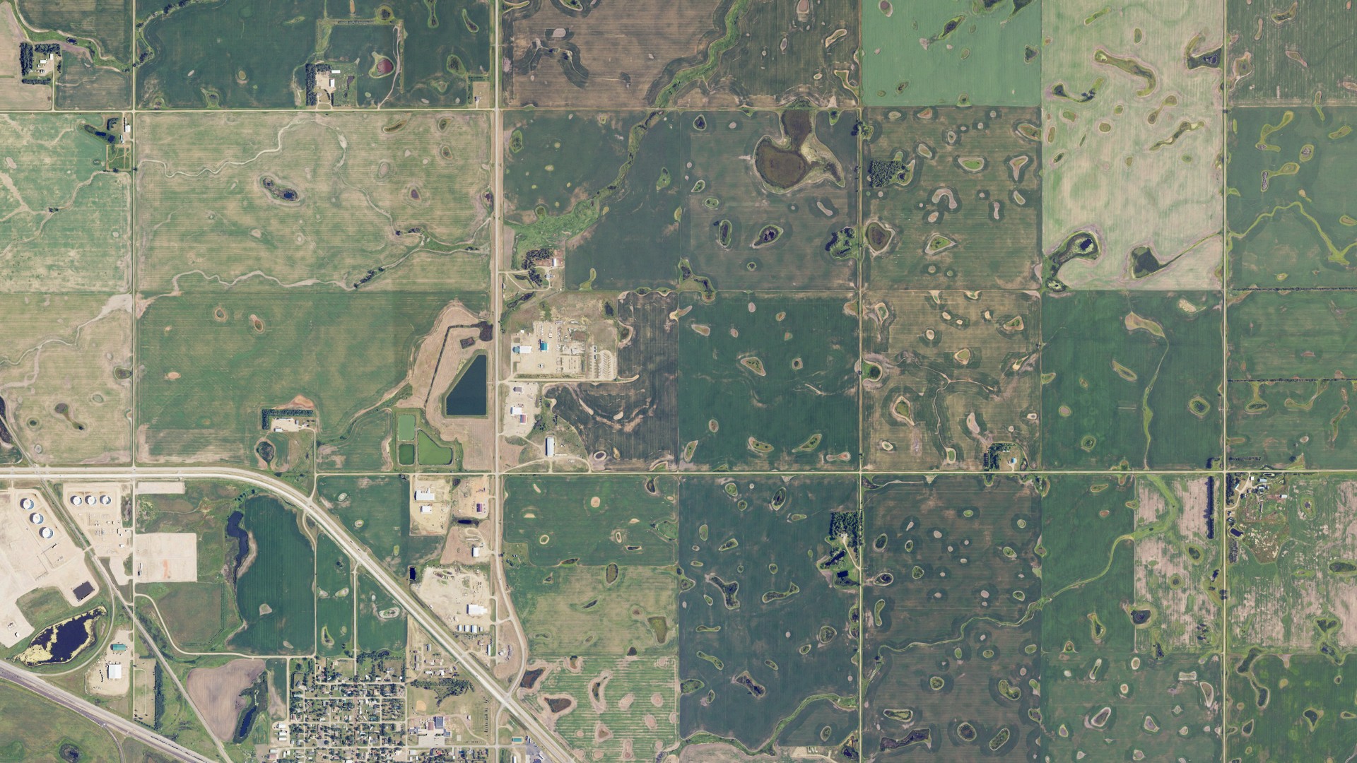 Natural-color aerial photograph of land around Berthold, North Dakota