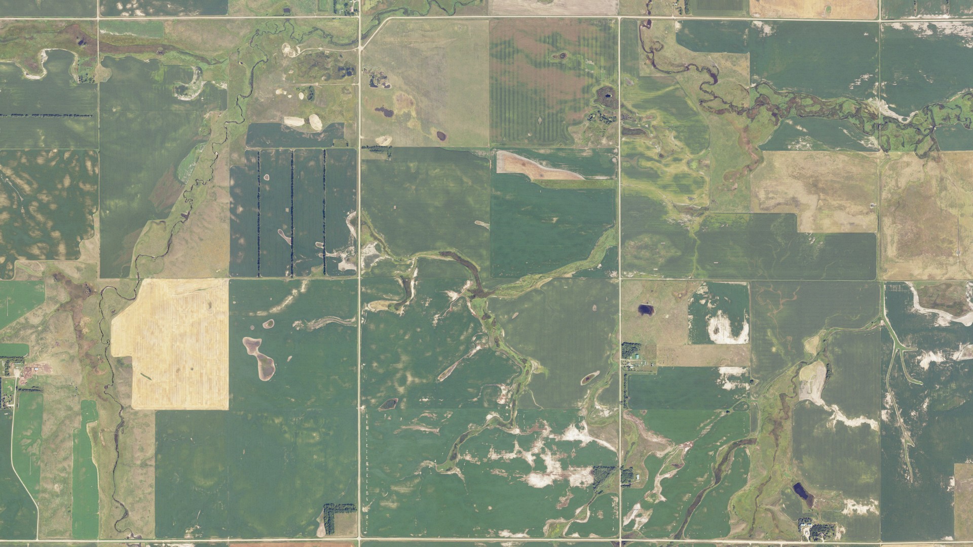 Natural-color aerial photograph of land around Hawksnest, North Dakota