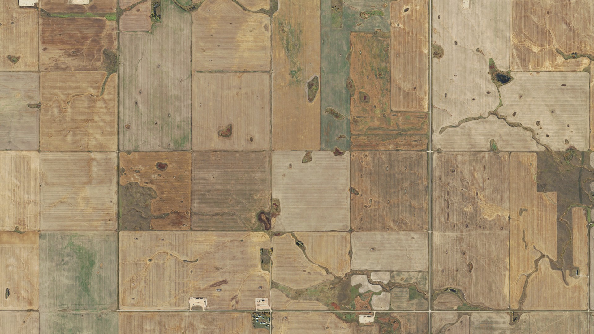 Natural-color aerial photograph of land around Bull Butte, North Dakota