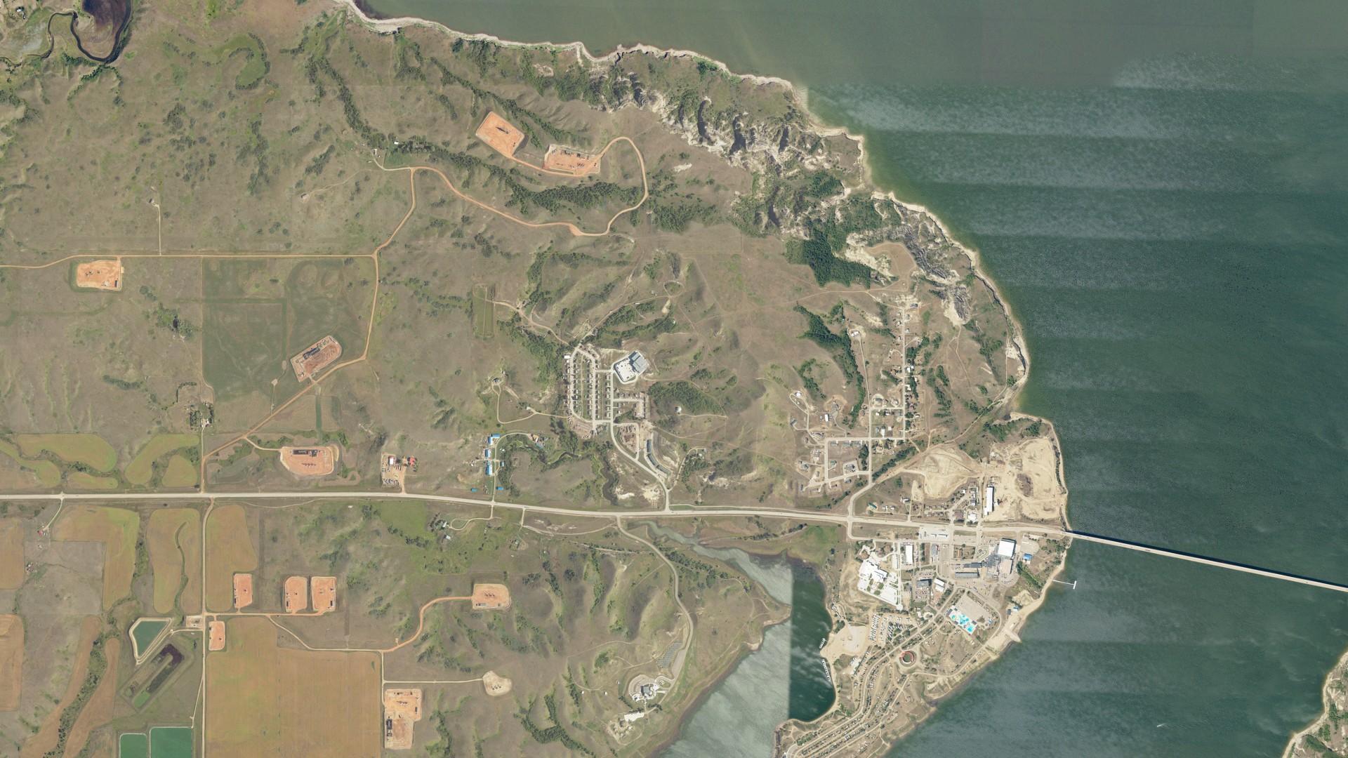Natural-color aerial photograph of land around Four Bears Village, North Dakota