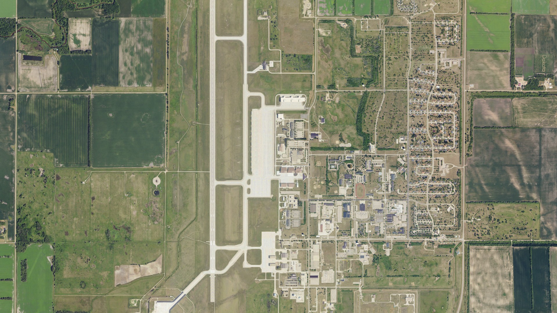 Natural-color aerial photograph of land around Grand Forks AFB, North Dakota