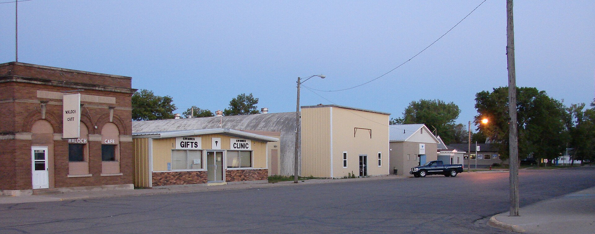 View of the east side of Gwinner's main street at dusk. The Bobcat factory would be to the left of this image. — North Dakota