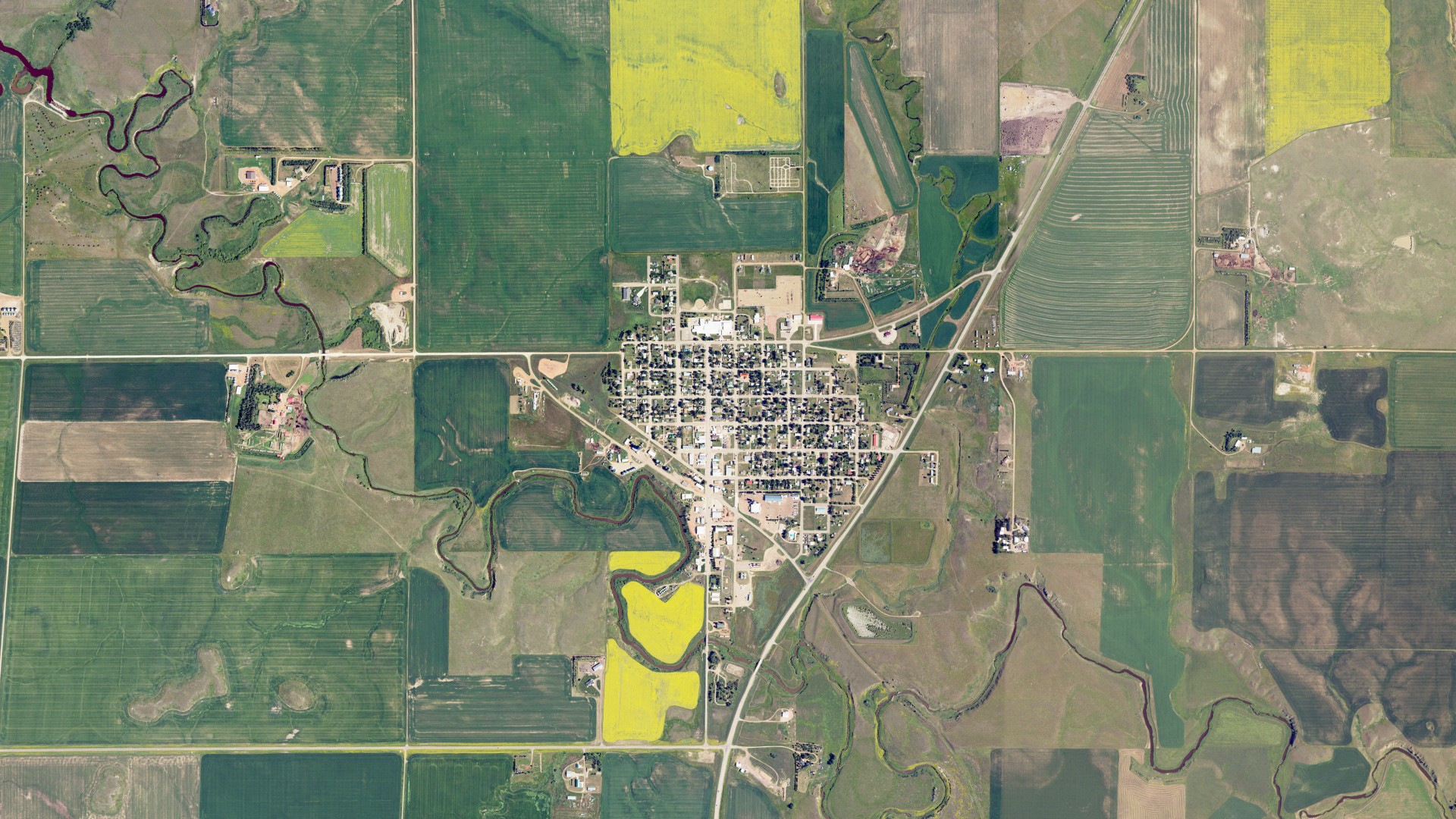 Natural-color aerial photograph of land around New England, North Dakota