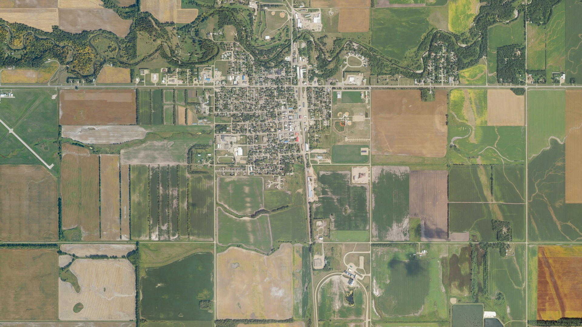 Natural-color aerial photograph of land around Park River, North Dakota