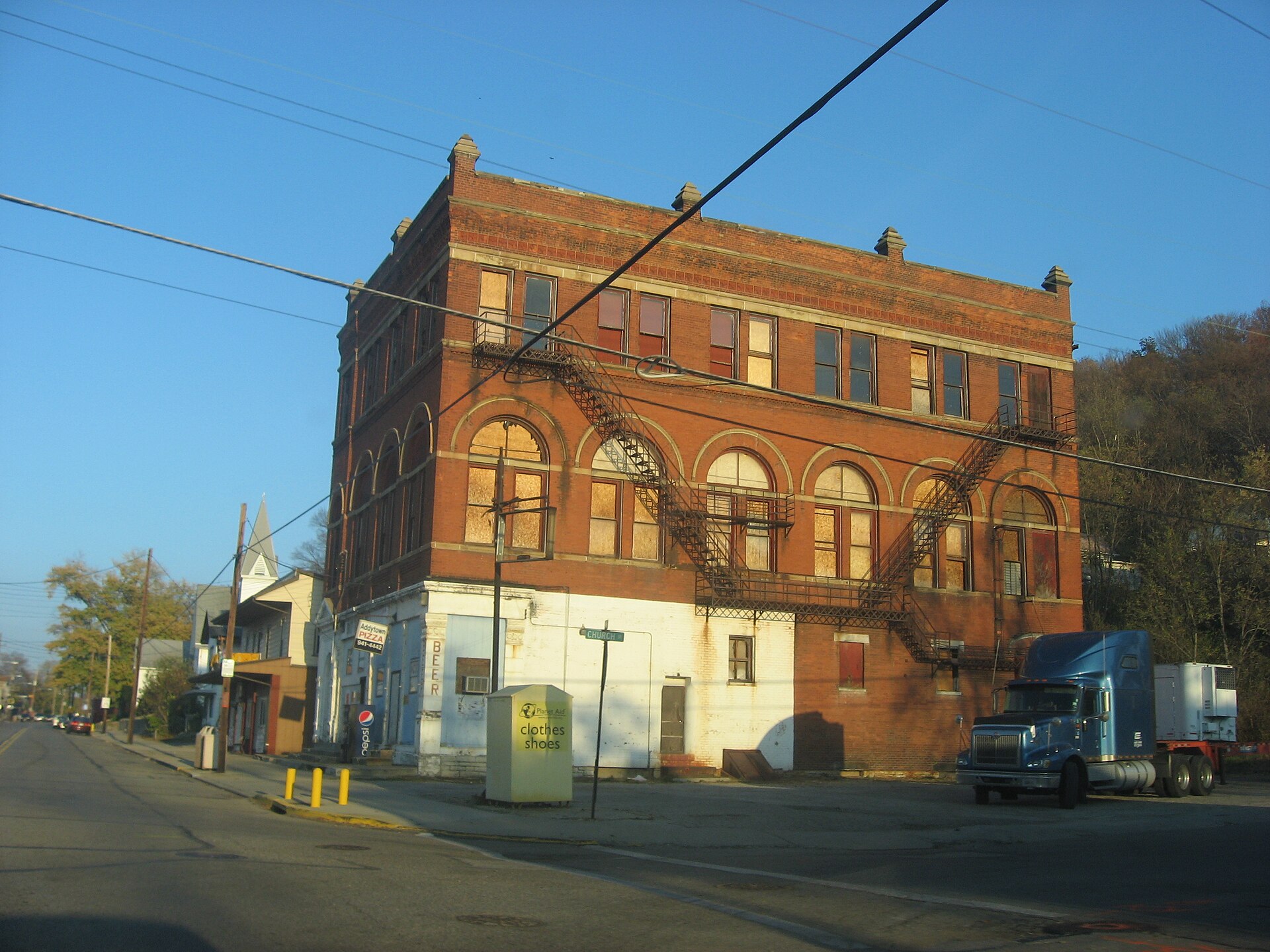 Eastern side of the building on the northwestern corner of the intersection of Main and Church Streets in downtown Addyston, Ohio, United States.