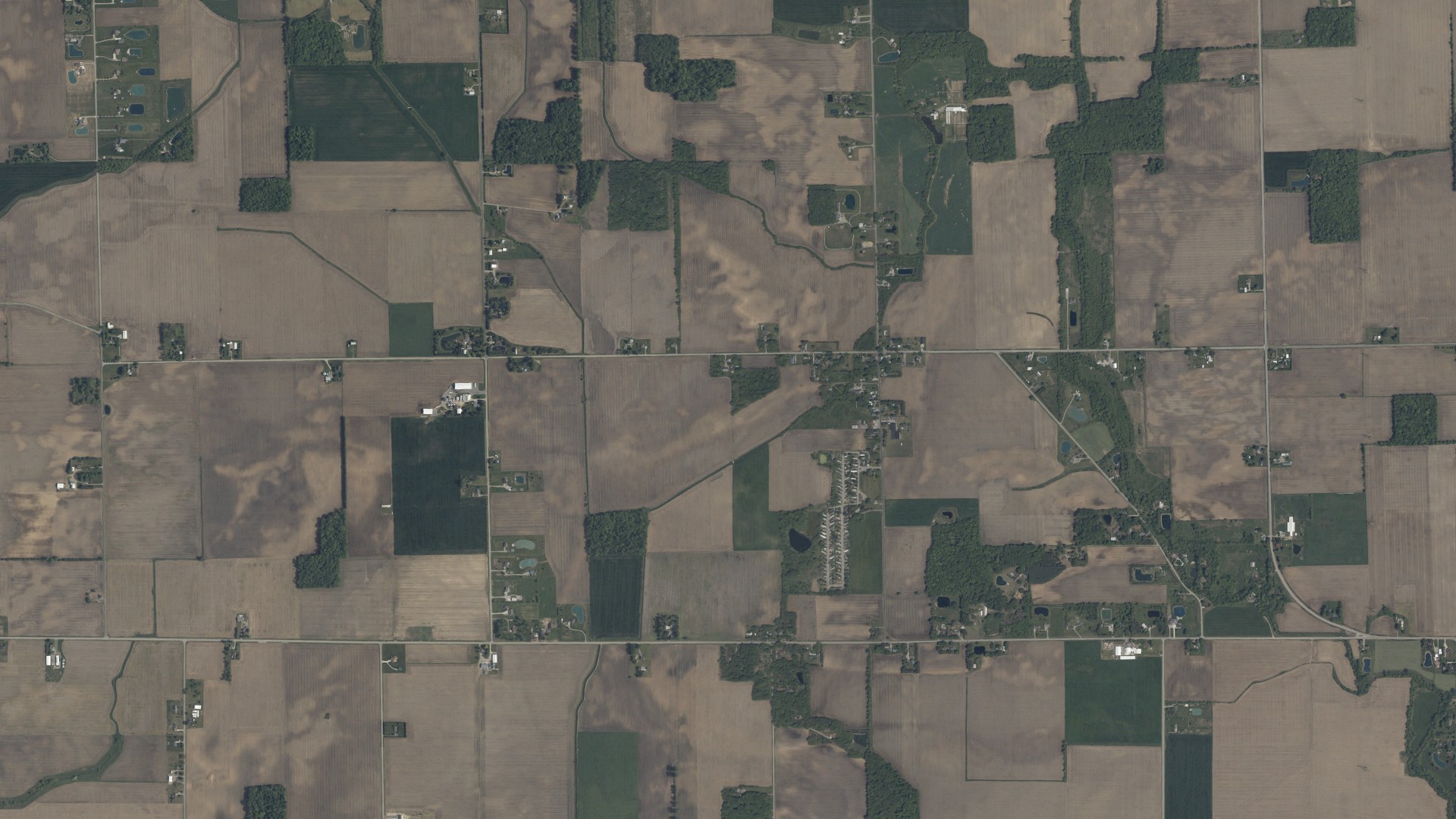 Natural-color aerial photograph of land around Ai, Ohio