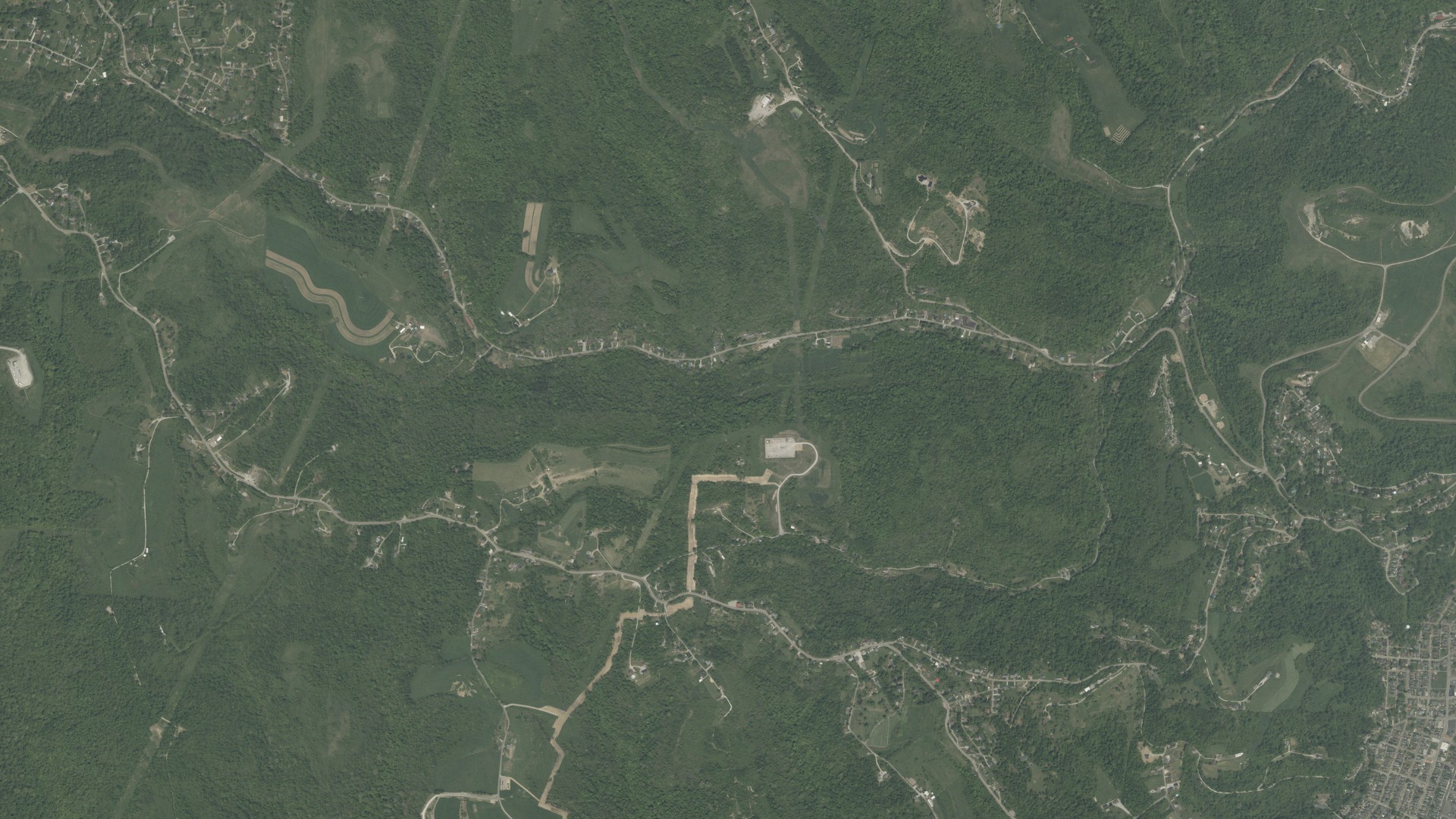 Natural-color aerial photograph of land around Pease, Ohio