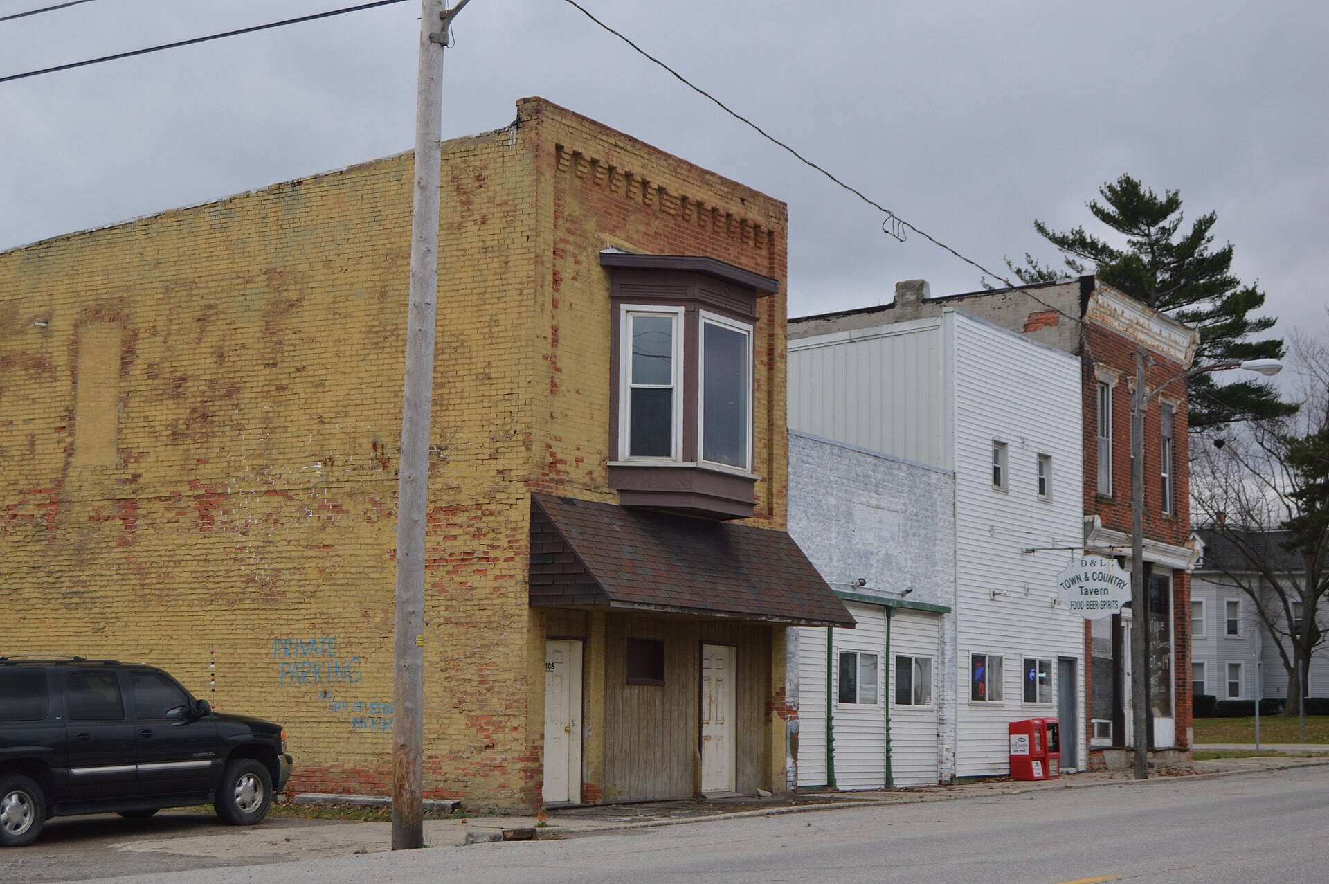 Buildings on the southern side of Main Street (U.S. Route 20) east of Michigan Street in Alvordton, Ohio, United States.